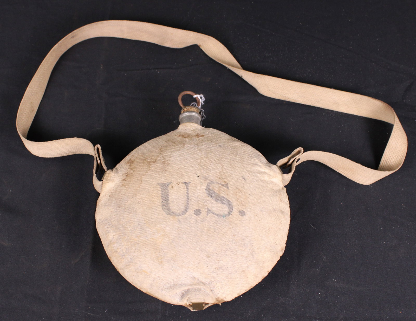 U.S. Marked Spanish-American War Era Tin Canteen (FMI): Description coming soon! Bidders are welcome to preview items in person during our normal operating hours Tuesday through Saturday 11am-6pm. Estimated shipping parcel size (LxWxH) 12 inches x 12 inche