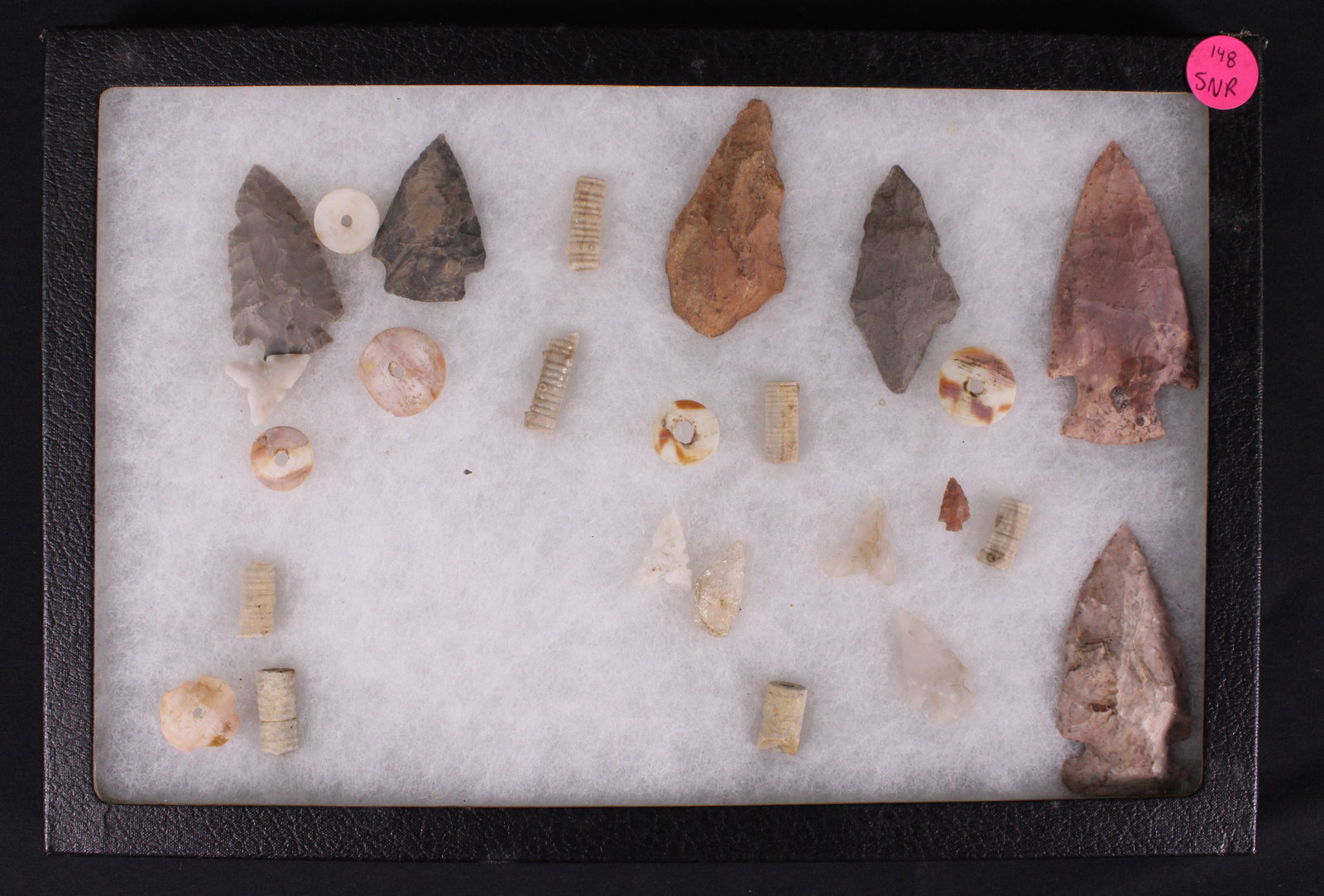 Native American Necklace Pieces and Arrow Heads (SNR): A Riker box full of various Native American necklace pieces with 12 arrow heads included. Riker box in very good condition with some minor bumps and scratches. Bidders are welcome to preview items in