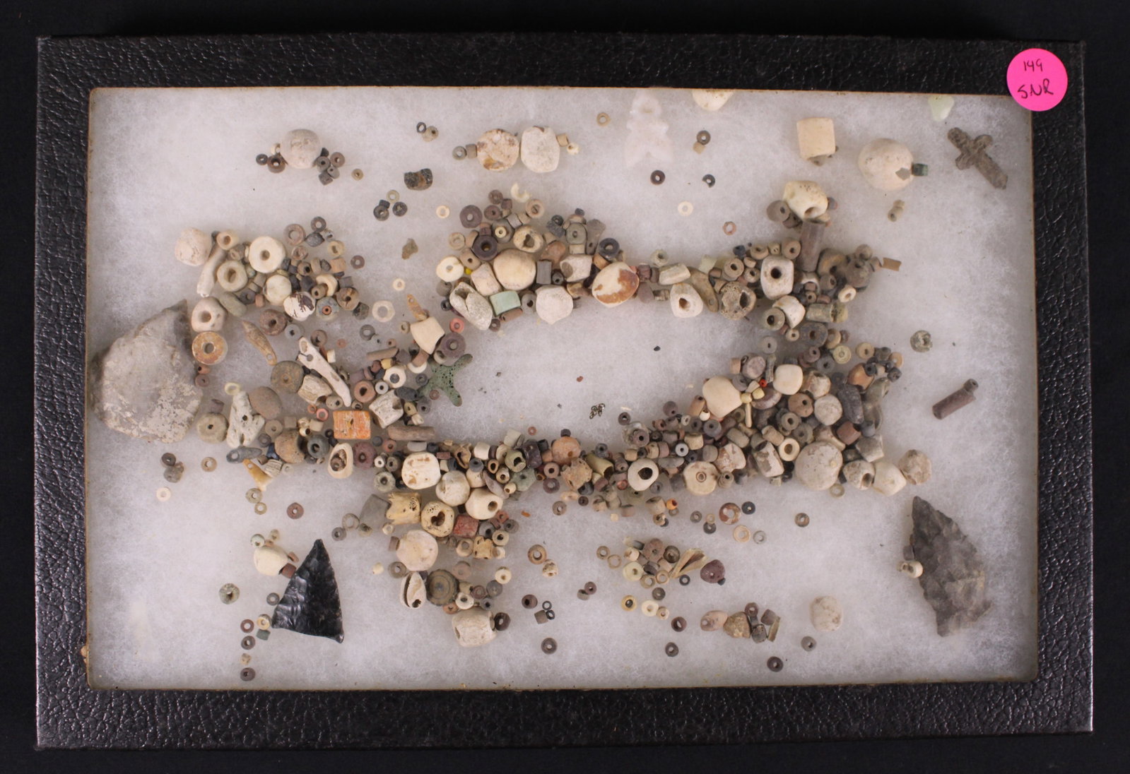 Native American Arrow Heads with Beads (SNR): A Riker box full of various Native American beads with a couple arrow heads included. Riker box in very good condition with some minor bumps and scratches. Bidders are welcome to preview items in