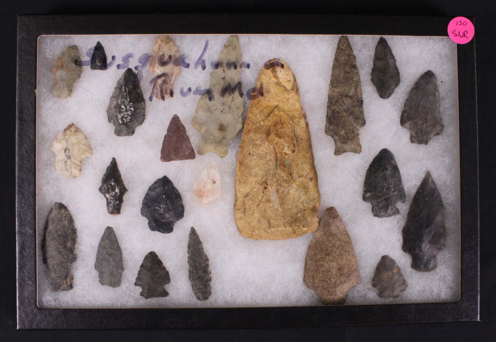 Native American Arrow Heads in Riker Box (SNR): A Riker box full of 22 various Native American spear heads made from various materials such as flint and other knapped materials. Riker box in very good condition with some minor bumps and