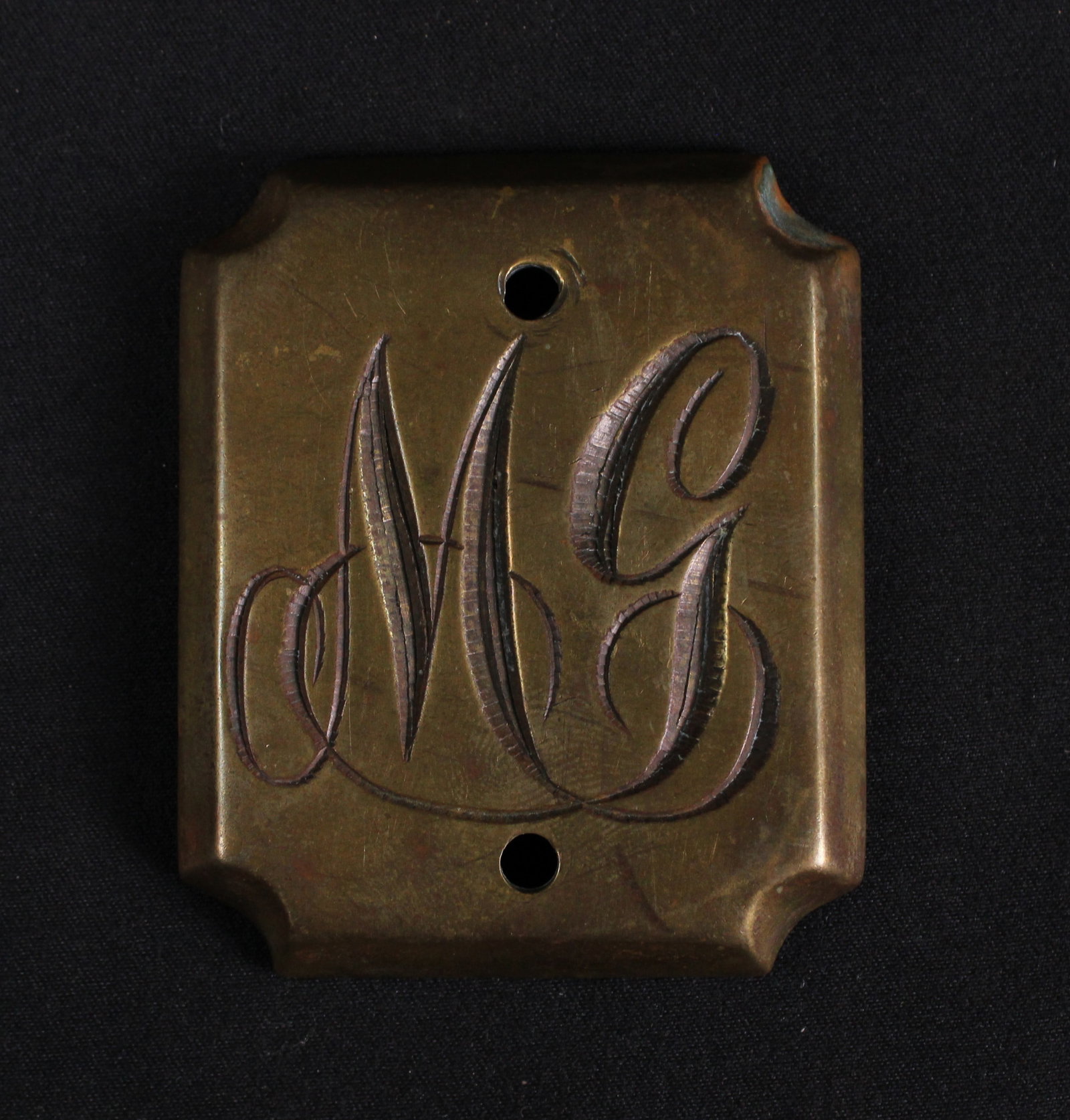 Decorative Brass Buckle Engraved with An M And A G (SNR): Description coming soon! Bidders are welcome to preview items in person during our normal operating hours Tuesday through Saturday 11am-6pm. Estimated shipping parcel size (LxWxH) 6 inches x 6 inches