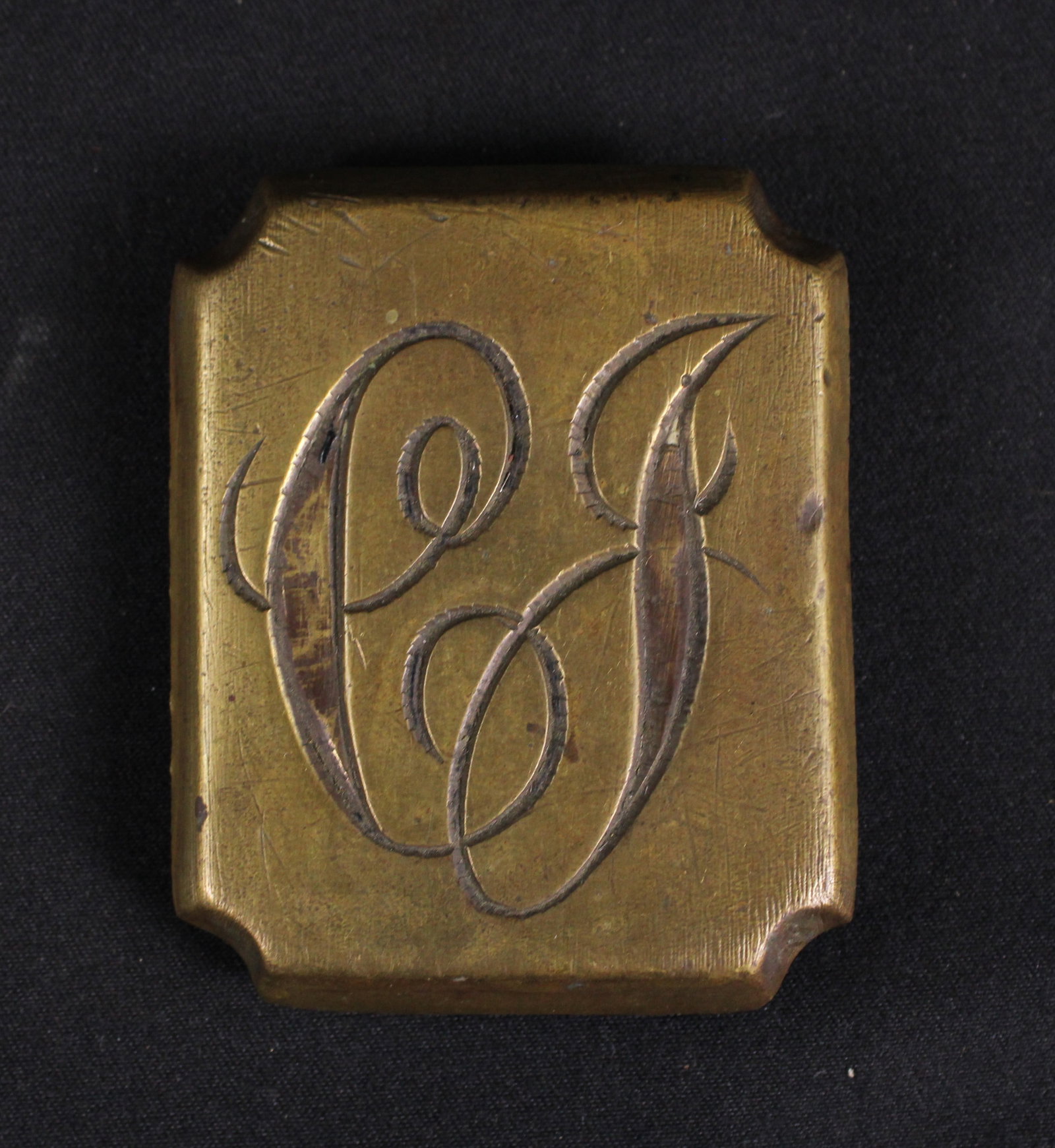 Decorative Brass Buckle Engraved with An C And A J (SNR): Description coming soon! Bidders are welcome to preview items in person during our normal operating hours Tuesday through Saturday 11am-6pm. Estimated shipping parcel size (LxWxH) 6 inches x 6 inches