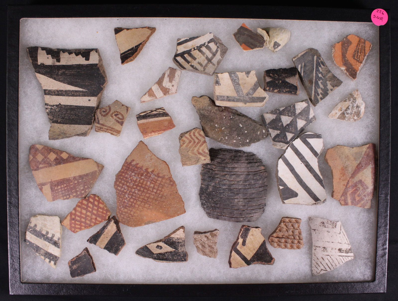 Group Lot: Riker Box of Native American Clay Pottery Shards (SNR): Suspected to be ancestorial Puebloan pottery shards dating back to the 15th-16th century. Bidders are welcome to preview items in person during our normal operating hours Tuesday through Saturday