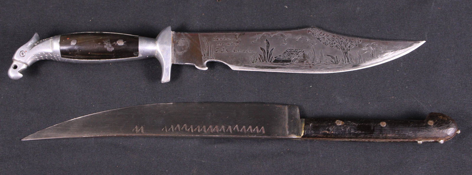 Group Lot: Two fixed Blade Knives (KFC): Description coming soon Bidders are welcome to preview items in person during our normal operating hours Tuesday through Saturday 11am-6pm. Estimated shipping parcel size (LxWxH) 10 inches x 6 inches