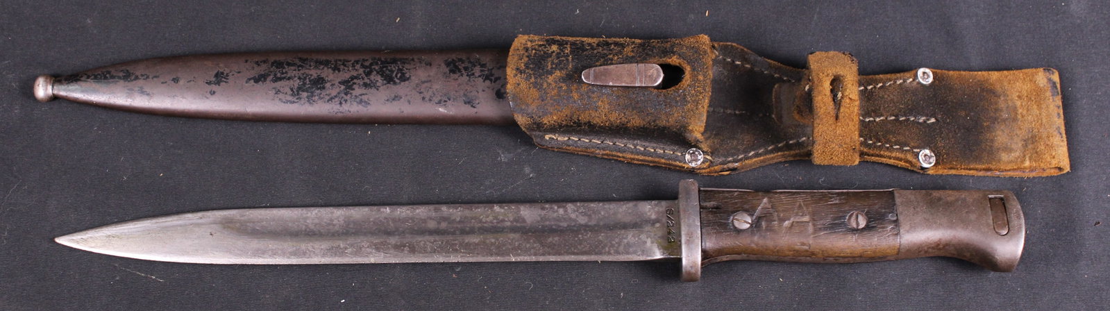German K98 Bayonet Produced Berg and Co. with Two Sets Of Initials And Frog (BTJ): Description coming soon Bidders are welcome to preview items in person during our normal operating hours Tuesday through Saturday 11am-6pm. Estimated shipping parcel size (LxWxH) 10 inches x 6 inches