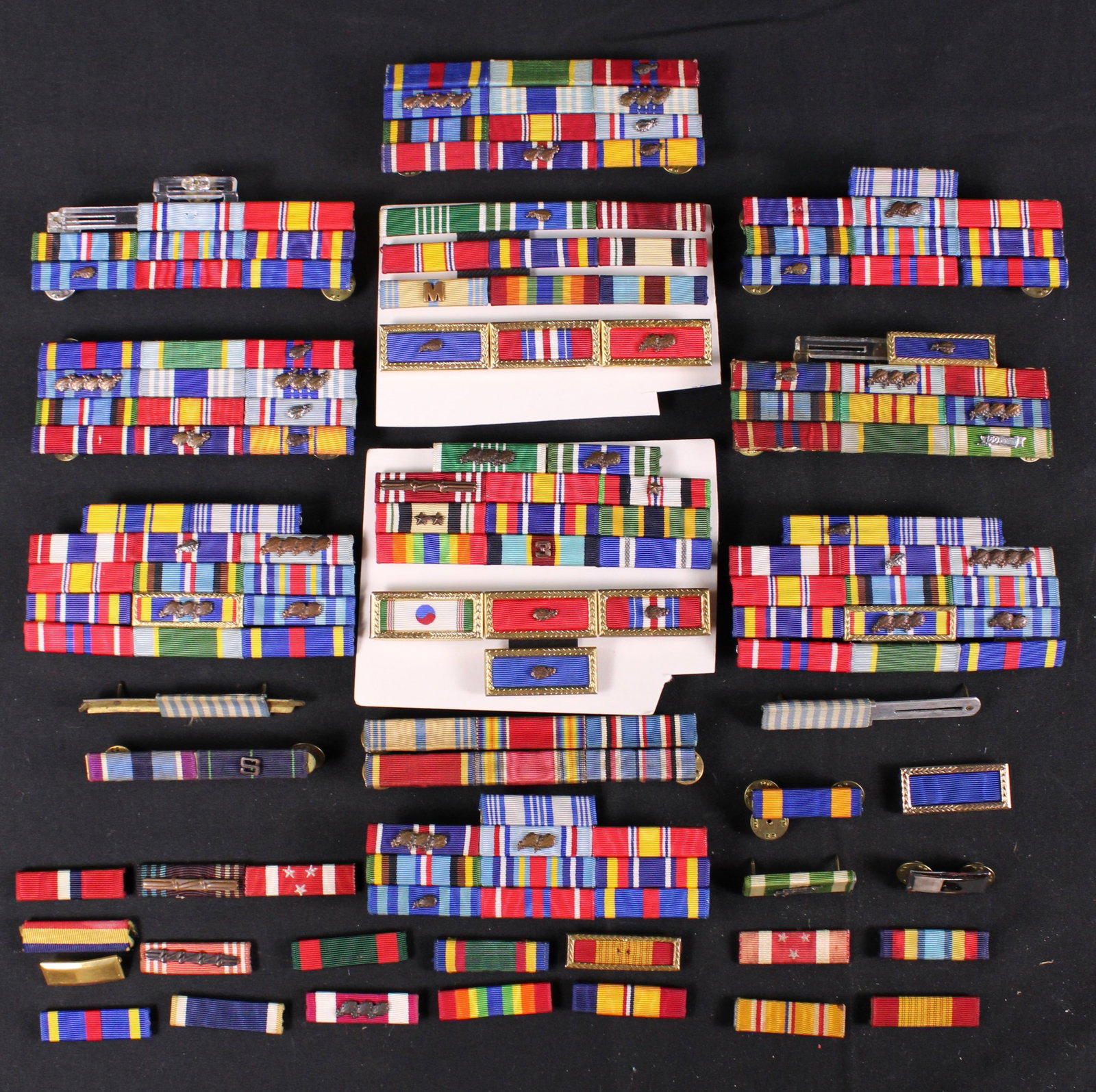 Group Lot of American Ribbons with Racks (KFC): Description coming soon Bidders are welcome to preview items in person during our normal operating hours Tuesday through Saturday 11am-6pm. Estimated shipping parcel size (LxWxH) 6 inches x 6 inches