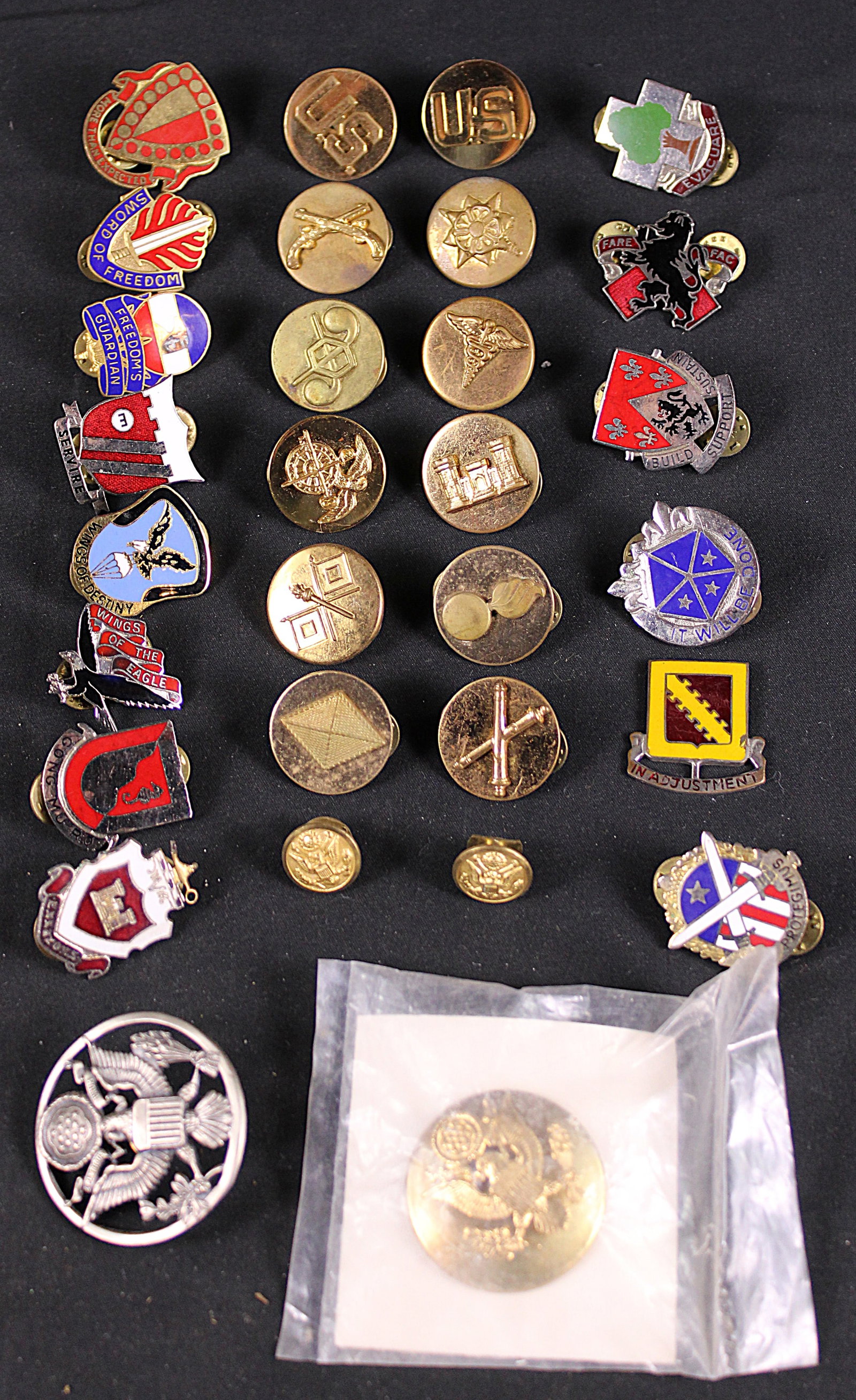 Group Lot Of U.S. Military Insignia (GTM): Description coming soon Bidders are welcome to preview items in person during our normal operating hours Tuesday through Saturday 11am-6pm. Estimated shipping parcel size (LxWxH) 6 inches x 6 inches