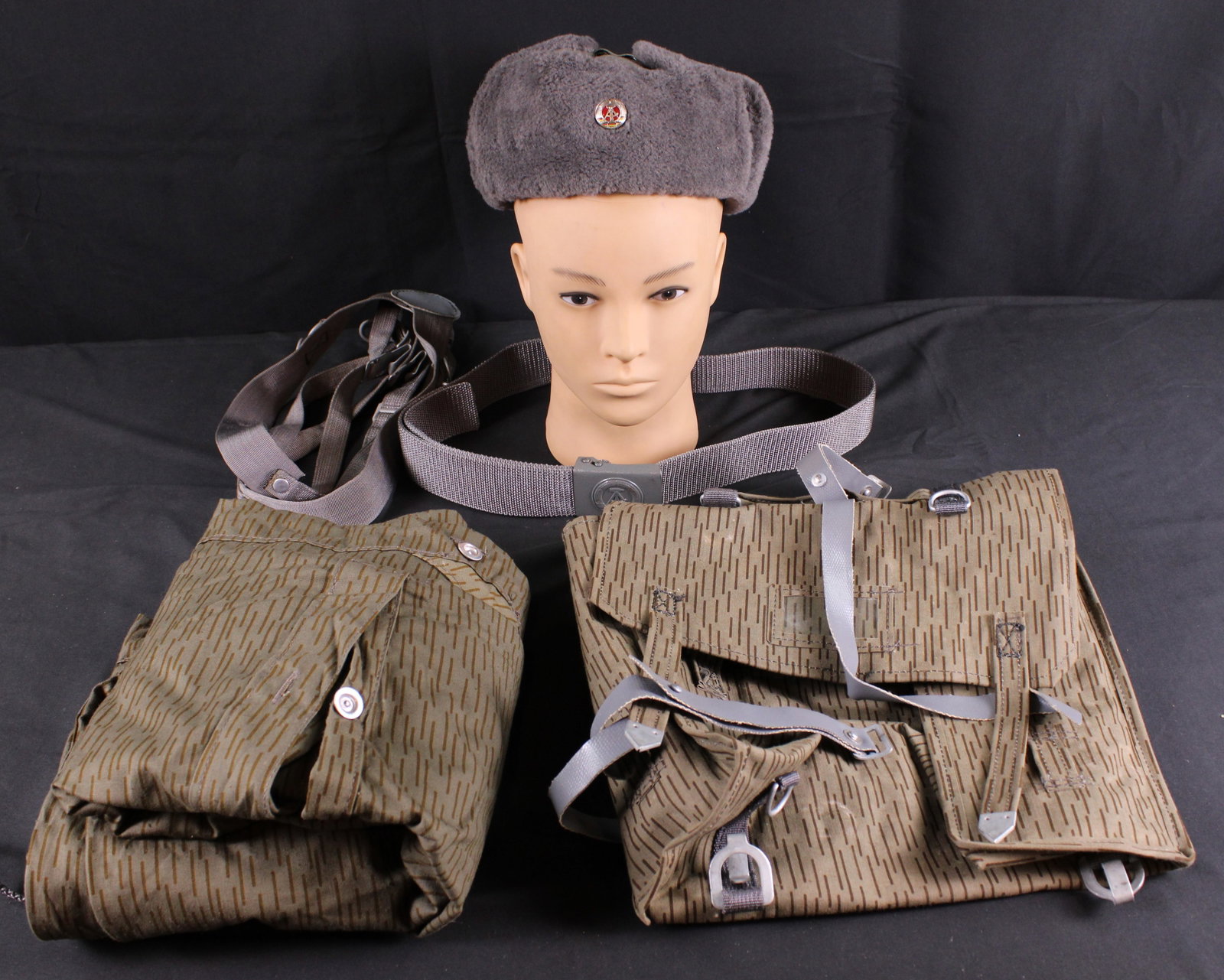 Group Lot Of East German Uniform Items (BTJ): Description coming soon Bidders are welcome to preview items in person during our normal operating hours Tuesday through Saturday 11am-6pm. Estimated shipping parcel size (LxWxH) 18 inches x 12 inches
