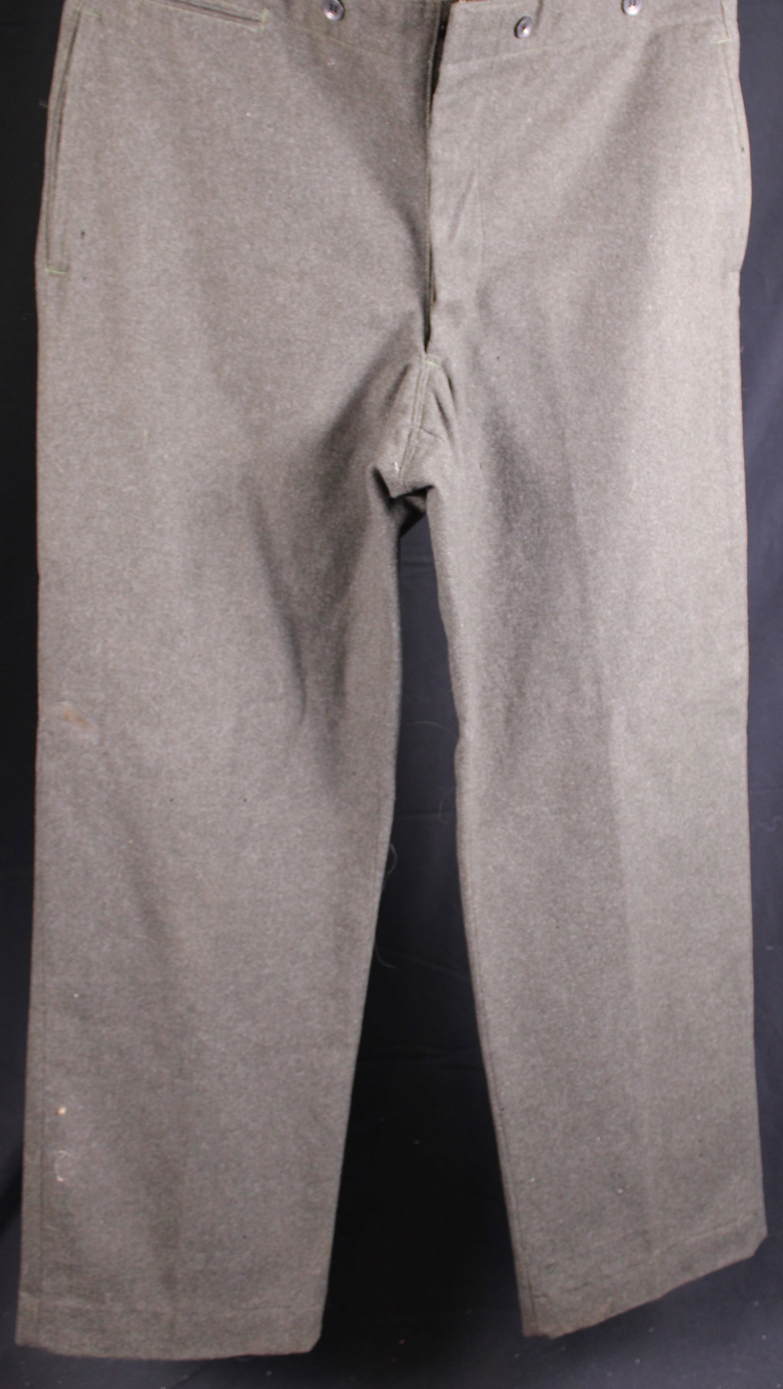 WWII 1943 Dated Wool Trousers (JAA): Description coming soon Bidders are welcome to preview items in person during our normal operating hours Tuesday through Saturday 11am-6pm. Estimated shipping parcel size (LxWxH) 12 inches x 12