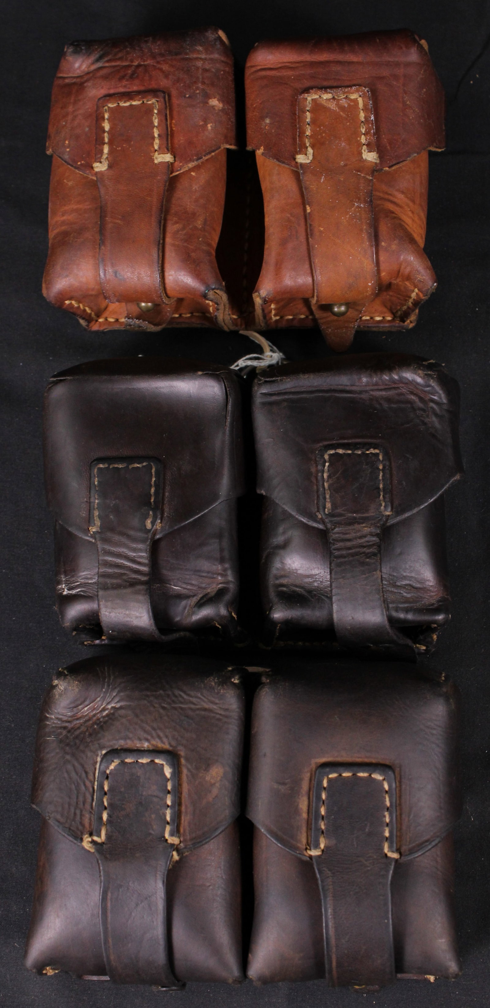 Three Yugoslavian Mauser Dual Ammunition Pouches (MAT): Description coming soon Bidders are welcome to preview items in person during our normal operating hours Tuesday through Saturday 11am-6pm. Estimated shipping parcel size (LxWxH) 12 inches x 8 inches