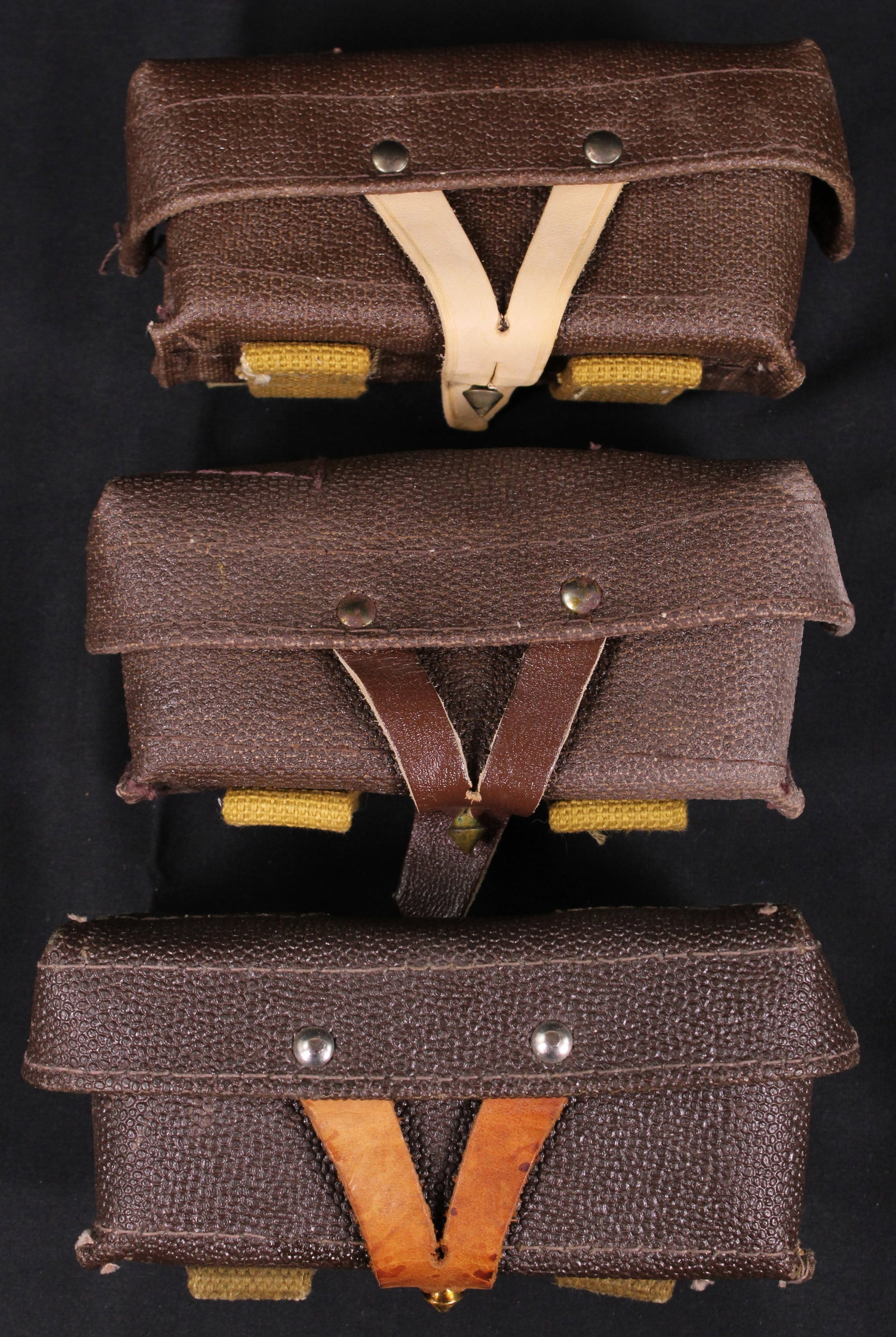 Three SKS Ammunition Pouches (HRR): Description coming soon Bidders are welcome to preview items in person during our normal operating hours Tuesday through Saturday 11am-6pm. Estimated shipping parcel size (LxWxH) 8 inches x 6 inches