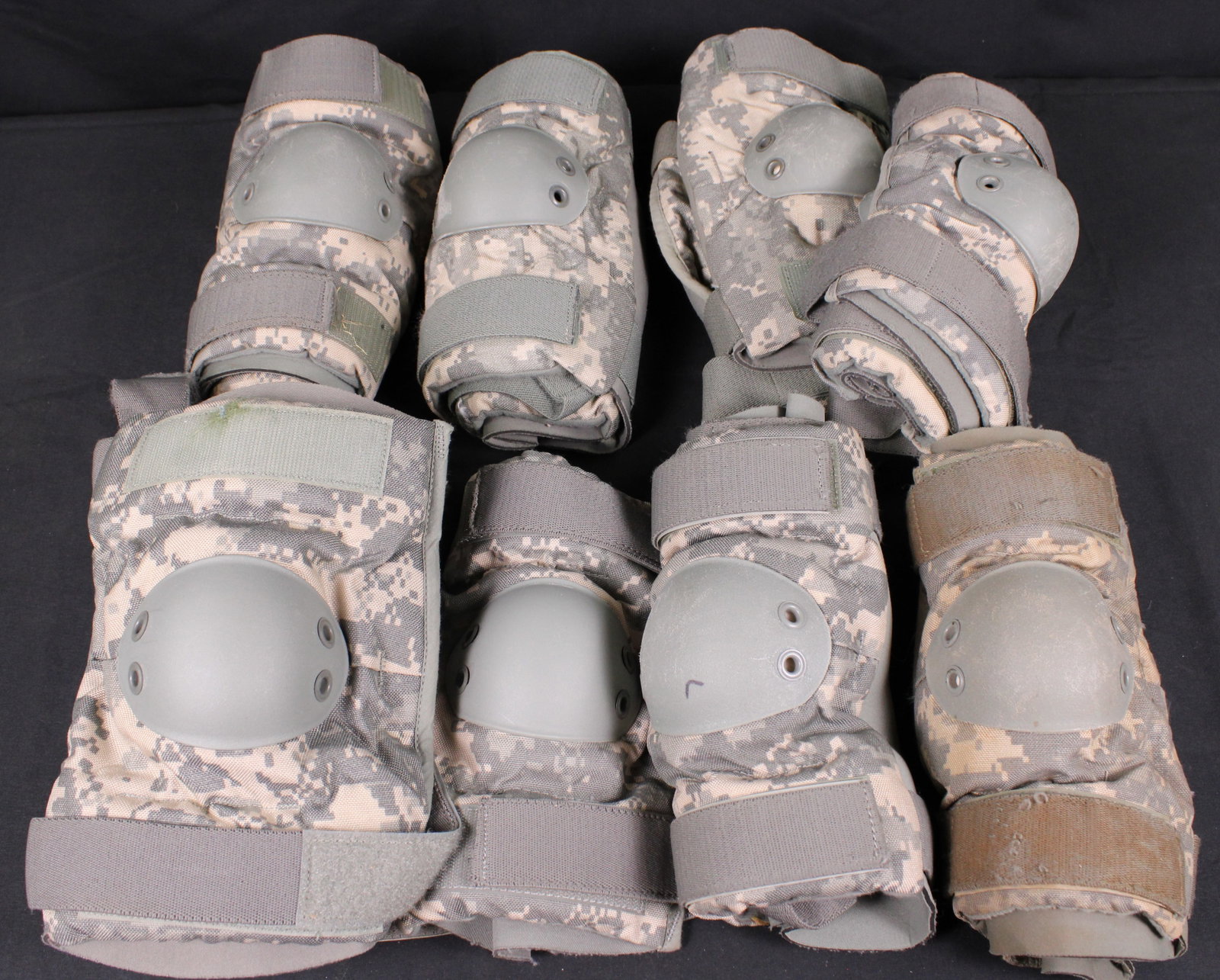 Group Lot Of _#_ ACU Pattern Knee Pads In A Seabag (VWC): Description coming soon Bidders are welcome to preview items in person during our normal operating hours Tuesday through Saturday 11am-6pm. Estimated shipping parcel size (LxWxH) 24 inches x 24