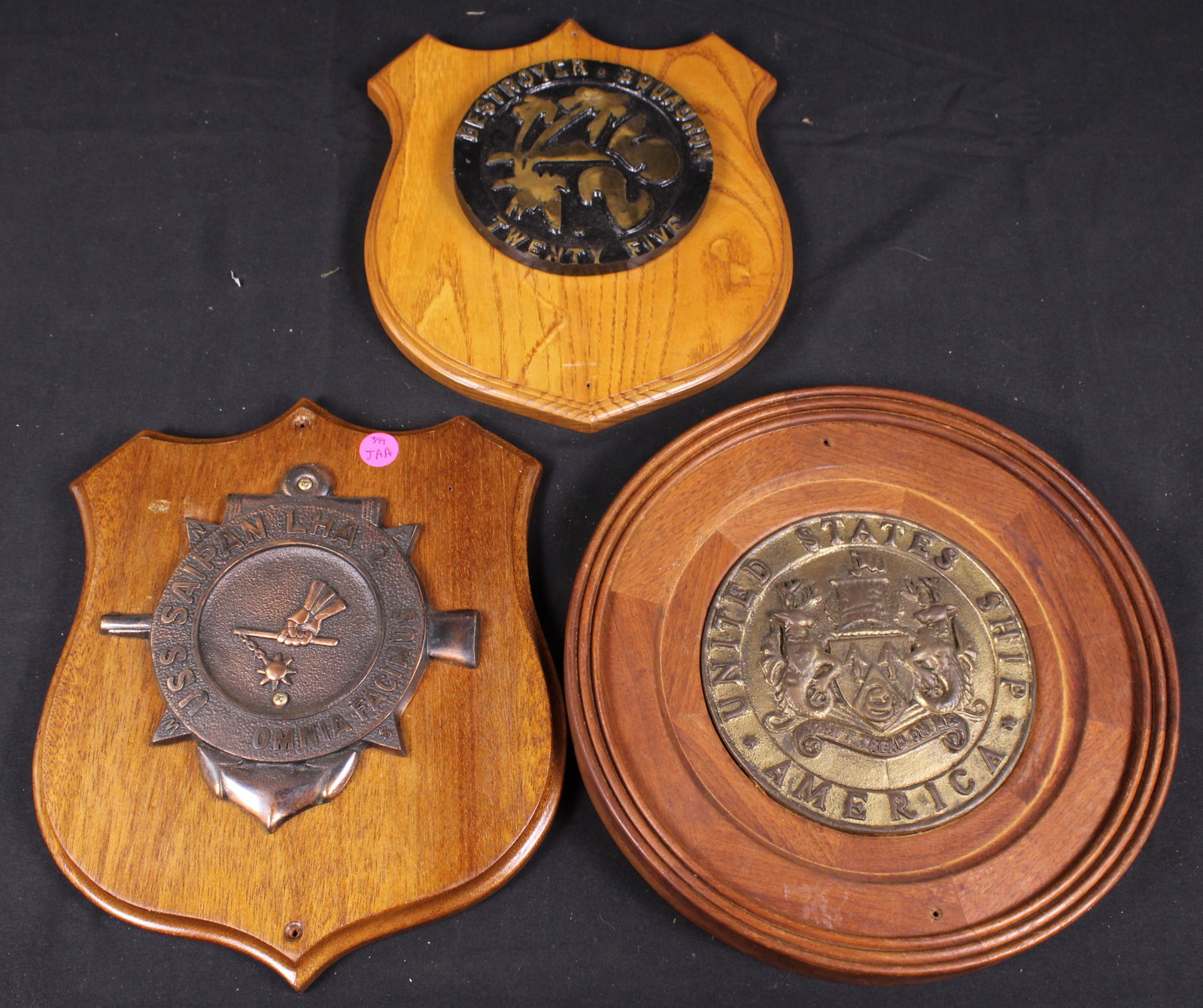 Three Naval Plaques (JAA): Description coming soon Bidders are welcome to preview items in person during our normal operating hours Tuesday through Saturday 11am-6pm. Estimated shipping parcel size (LxWxH) 12 inches x 12