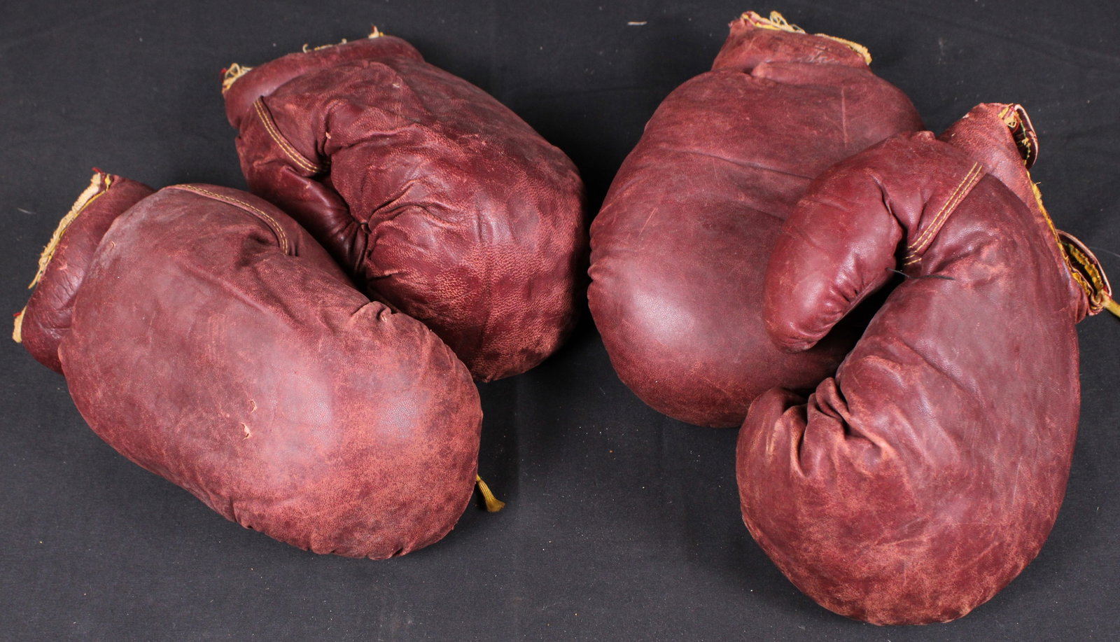 Two Pairs Of Vintage U.S. Navy Boxing Gloves c.WWII (JAA): Description coming soon Bidders are welcome to preview items in person during our normal operating hours Tuesday through Saturday 11am-6pm. Estimated shipping parcel size (LxWxH) 12 inches x 12