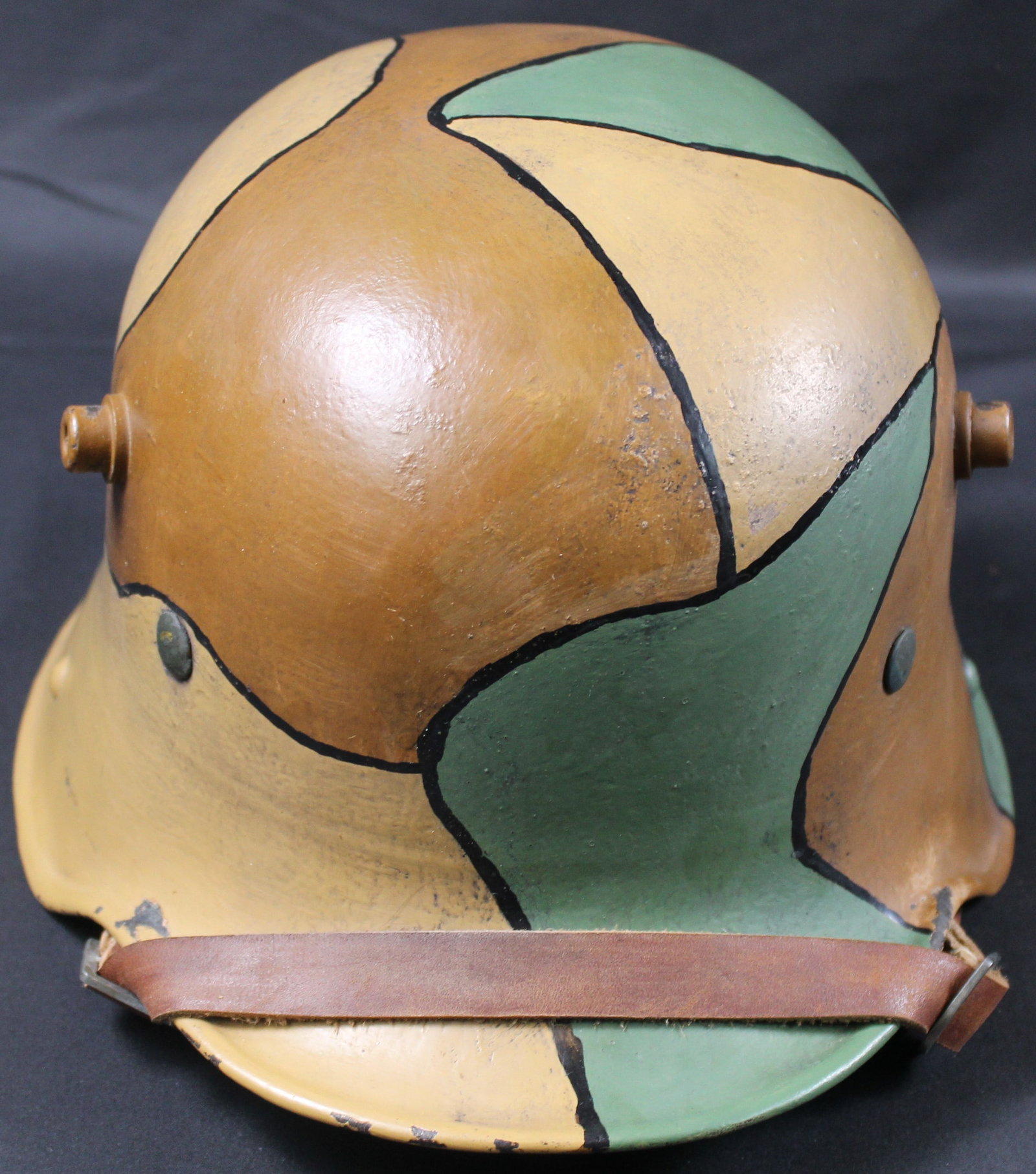 Rare WWI Imperial German Army M1916 Stahlhelm Helmet (SNR): A rare WWI German camo painted M16 Stahlhelm helmet in very good to excellent condition overall. Nearly all of the paint is retained with some minor scattered scuffs and scratches, and the liner is in