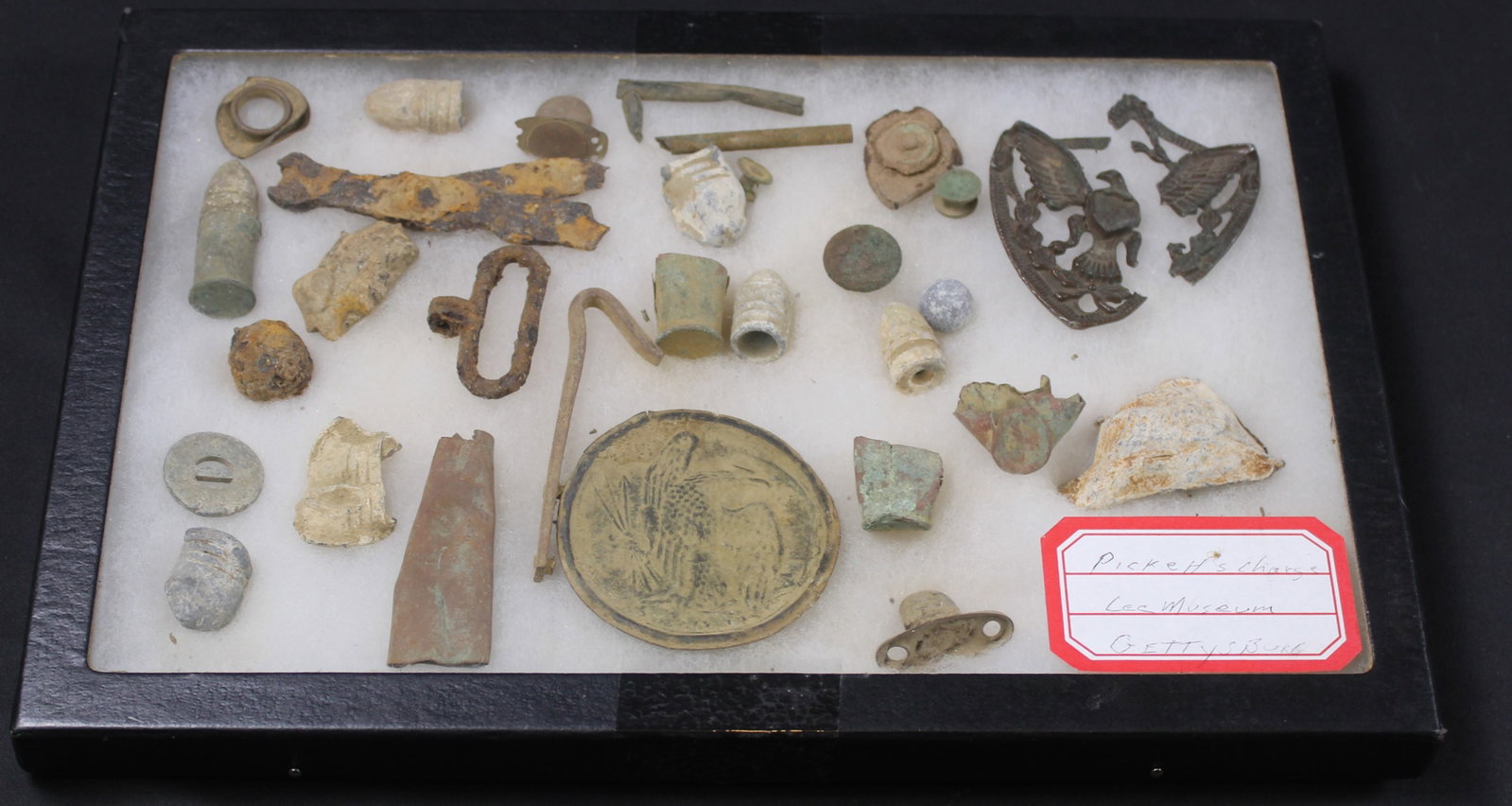 Pickett's Charge Lee Museum Civil War Relic Lot (SNR): A large Riker box measuring 12 inches x 8 inches with grouping from Pickett's Charge. See pictures prior to bidding. Bidders are welcome to preview items in person during our normal operating hours