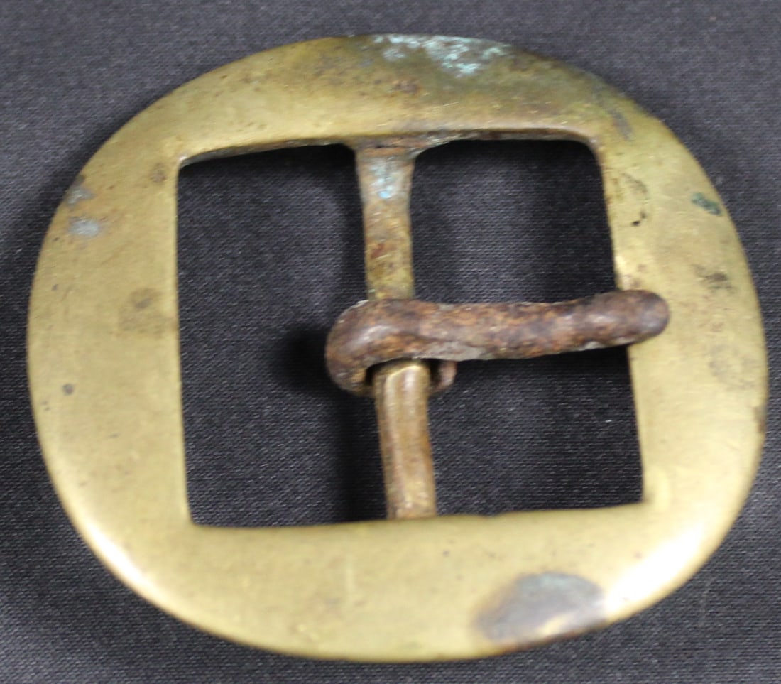 Antique Brass Military Style Center-Bar Belt Buckle (SNR): A suspected American Revolutionary War era circular-style brass belt buckle measuring approximately 2 inches x 2.25 inches in very good condition overall. The front side of the buckle exhibits a brigh