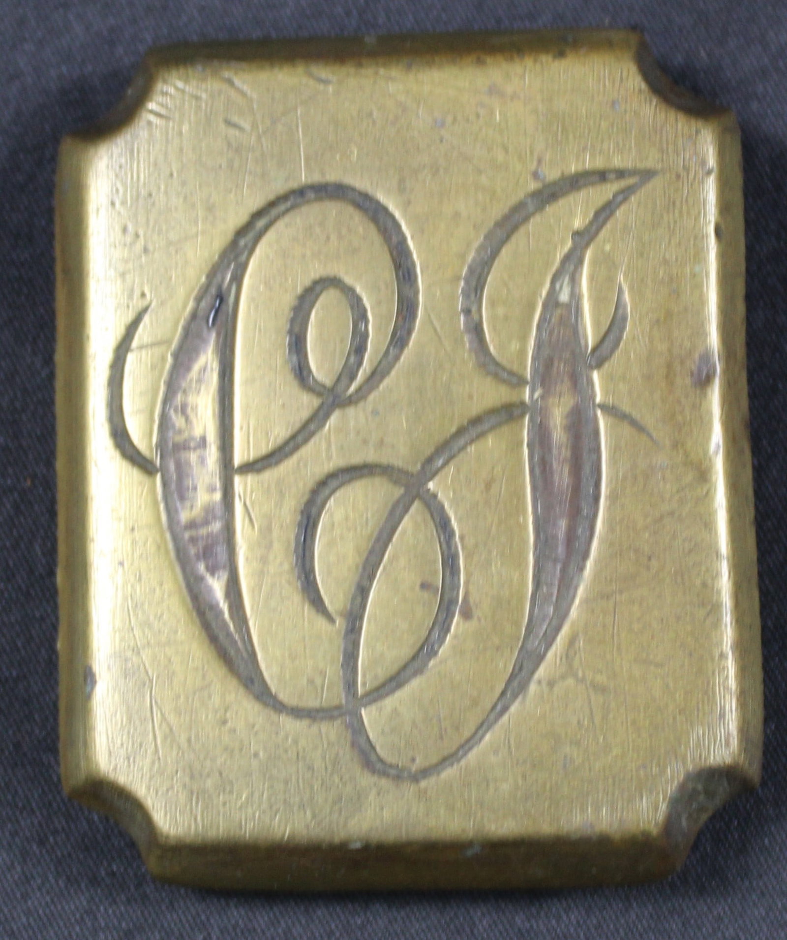 "CJ" Monogrammed Brass Belt Buckle c. American Revolutionary War (SNR): A monogrammed brass belt buckle from the collection of an avid American Revolutionary War enthusiast. This example appears to be embossed with the initials "CJ" prominently. The reverse side of the bu