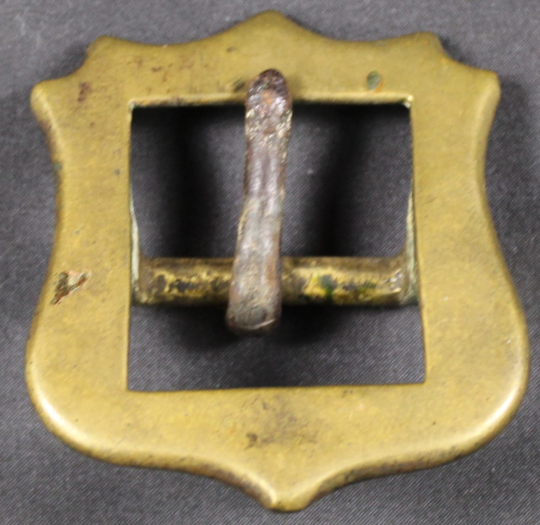 Vintage Men's Shield-Style Brass Belt Buckle (SNR): A suspected American Revolutionary War era shield-style brass belt buckle measuring approximately 2.5 inches x 2.25 inches in very good condition overall. The front side of the buckle exhibits a brigh