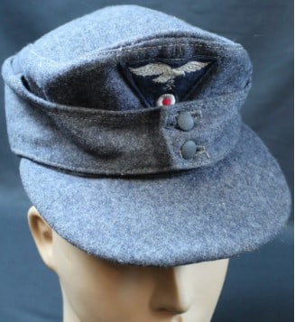 Rare WWII German Luftwaffe M43 1944 Dated Einheitsfeldmutze (MME): A rare WWII German Luftwaffe M43 Einheitsfeldmutze dated 1944 in very good condition overall. The cap is made of a gray colored wool that is in overall very good condition with no obvious signs of deg