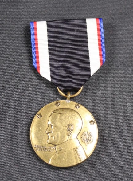 Pershing Occupation of Germany Medal c.1919 (MME): A Pershing Occupation or Germany Medal c.1919 featuring General John Pershing on the front as Commander, American Expeditionary Force WWI. Overall very good condition. Estimated shipping parcel size (