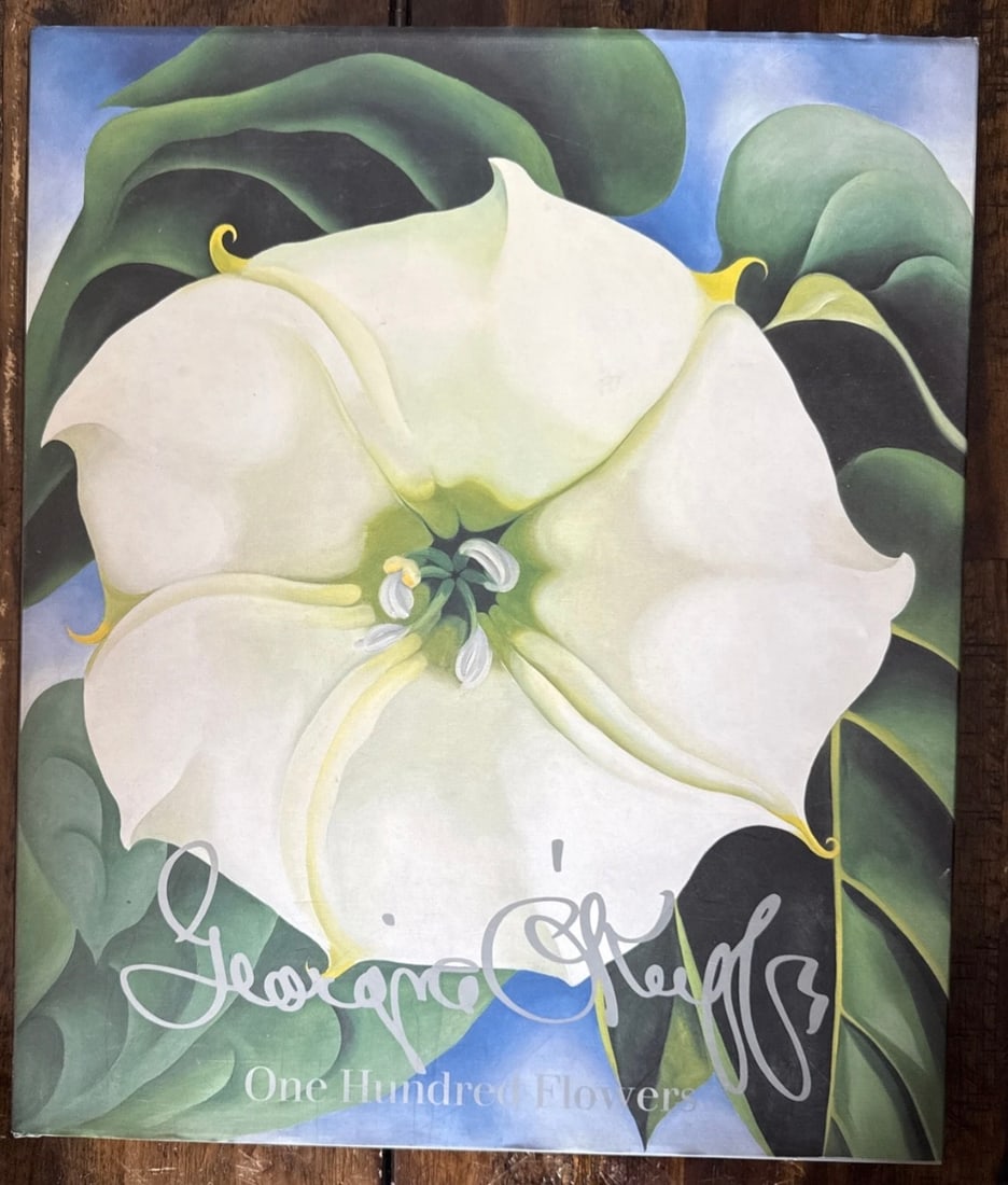 Georgia O'Keeffe: One Hundred Flowers Art Book: Georgia O'Keeffe: One Hundred Flowers Publisher - Alfred A. KnopfManufactured- Japan1989Soft cover10 x 12Illustrator: O'Keeffe, GeorgiaEdition: 1st Paperback EditionThis a beautiful collection of