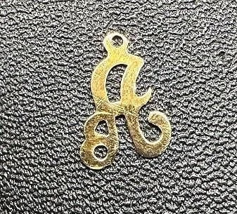 18K Gold Cursive "A" Pendant: 18K Yellow Gold Cursive "A" PendantOffered is a delicate 18K yellow gold cursive "A" pendant, ideal for a personalized necklace, charm stack, or initial jewelry project. The piece is minimal and light