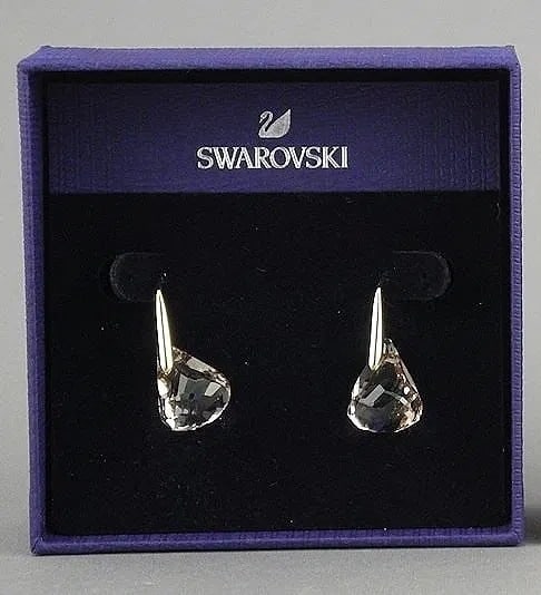 Swarovski Crystal Teardrop Earrings w/ Box: Swarovski Crystal Teardrop Earrings, Original Box Offered is a pair of Swarovski crystal drop earrings featuring faceted teardrop crystals in a clear/gray tone. A clean, luminous silhouette with stron