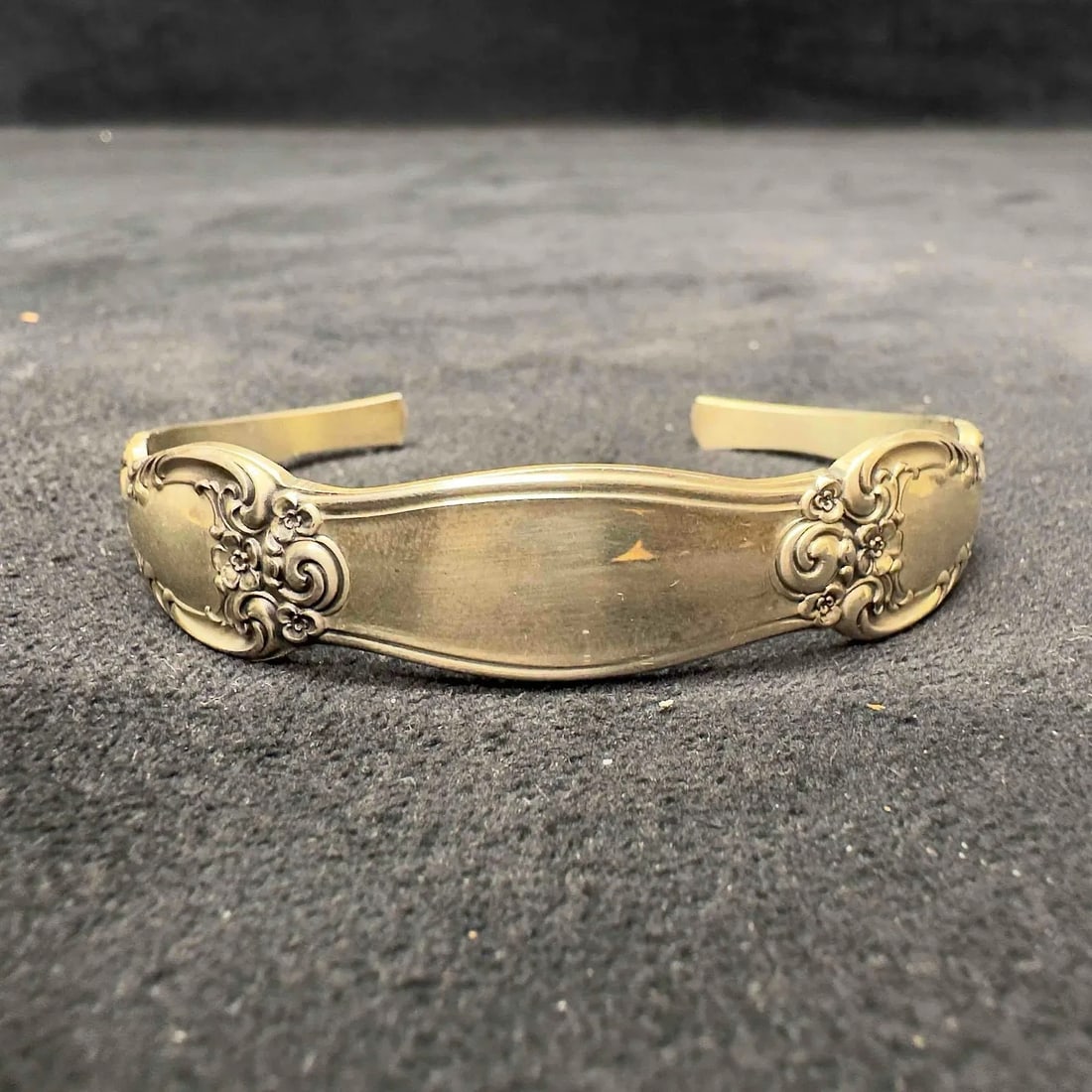 Gorham Sterling Silver (925) Spoon Cuff Bracelet w/ Box: Unique cuff bracelet crafted from a Gorham sterling silver double-handle spoon form, giving it a decorative, vintage-inspired silhouette. Tested and researched prior to listing. Comes with box. Highli