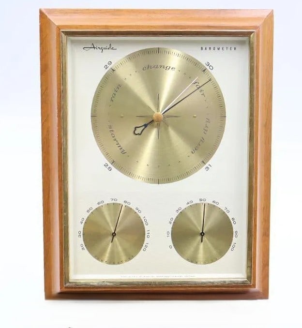 RARE Airguide 3-Dial Mid-Century Modern Wall Weather Station: Offered is a rare sophisticated mid-century modern "triple-dial" weather station manufactured by the Airguide Instrument Company of Chicago. Measuring approximately 13.25 x 10.5 inches, this horizonta