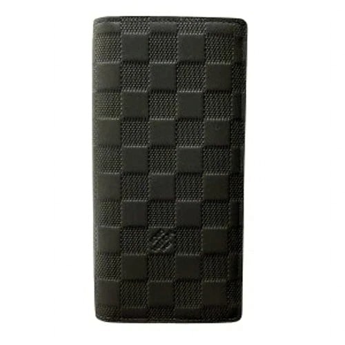 Louis Vuitton Porte-Feuille Brazza Long Wallet in Embossed Damier Infini Leather Black: Louis Vuitton Porte-Feuille Brazza long wallet in embossed Damier Infini leather (black). Slim, elegant profile with strong organization, ideal for those who prefer a refined, understated LV look in d