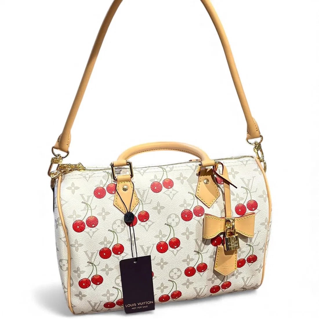 Louis Vuitton White Monogram "Cherry" Speedy 30 Beauté Bag – Gold Hardware – NIB: A vibrant and playful masterclass in Neo-Pop luxury: this Louis Vuitton Beauté Speedy 30 features the iconic white monogram canvas transformed by a series of high-saturation cherry accents. The archi