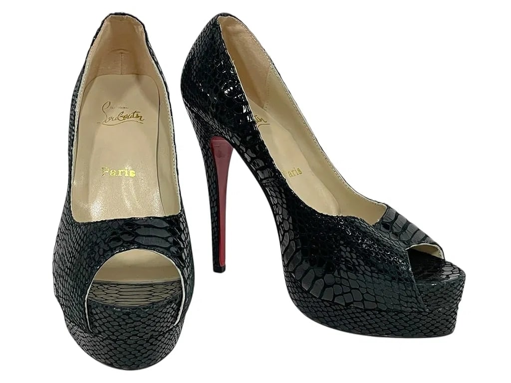 Christian Louboutin ParisSnakeskin Peep-Toe Platform Pumps US 9.5 NEW: Brand new, authentic Christian Louboutin Paris peep-toe platform pumps, US 9.5 (EU 40). Crafted in glossy black snakeskin-embossed leather with the iconic red lacquered soles. Dramatic peep-toe front