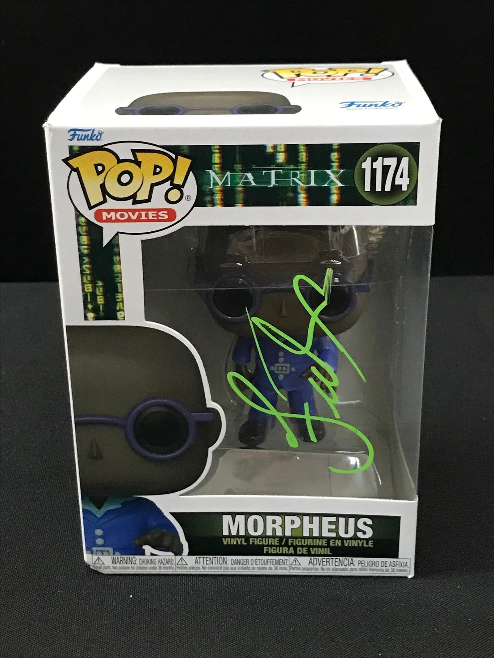 Laurence Fishburne Signed Morpheus Funko Pop! #1174 (The Matrix) KB COA: Autographed Funko Pop! Morpheus (#1174) from The Matrix universe, signed by Laurence Fishburne in green paint pen on the box window (see photos). Includes KB COA. A top-tier sci-fi autograph pairing o