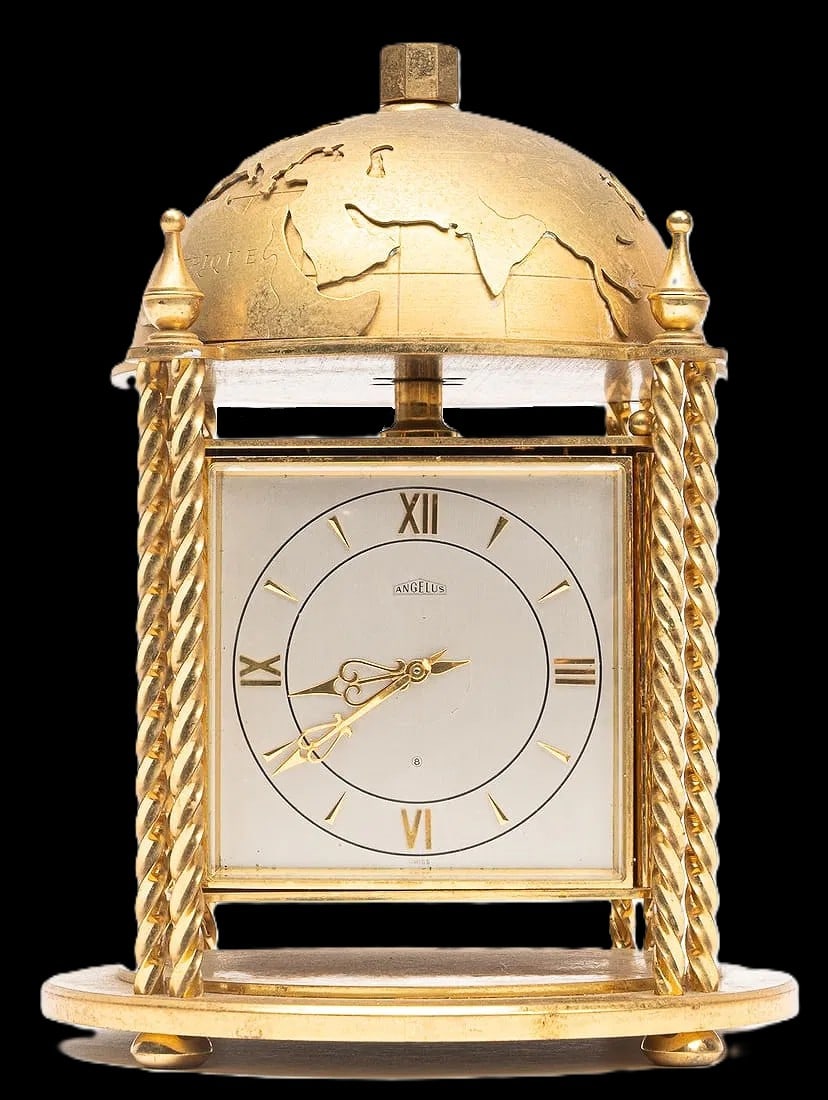 ANGELUS World Globe Weather Station 8-Day Swiss Desk Clock, Switzerland, c. 1950s 10" x 6": A distinguished masterclass in mid-century executive horology: this Angelus desk clock merges high-precision Swiss engineering with an architectural "Golden Age" design. The gilt metal case is crowned
