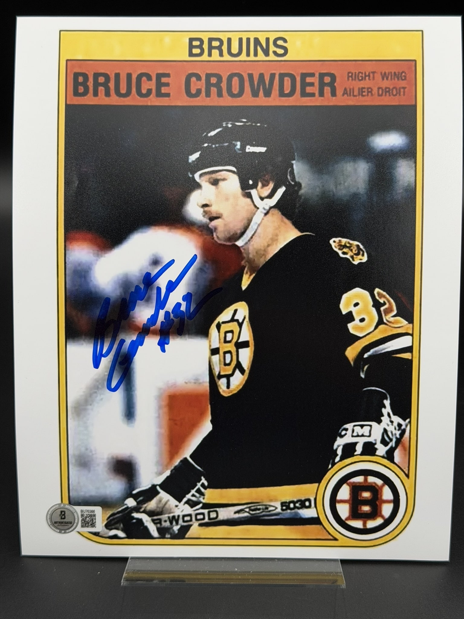 Autographed Bruce Crowder Boston Bruins 8" x 10" Hockey Card Style Photo Beckett COA: Vintage hockey card-style photograph personally signed by former Boston Bruins right winger Bruce Crowder in bold blue marker. The image features a classic trading card-inspired design highlighting Cr