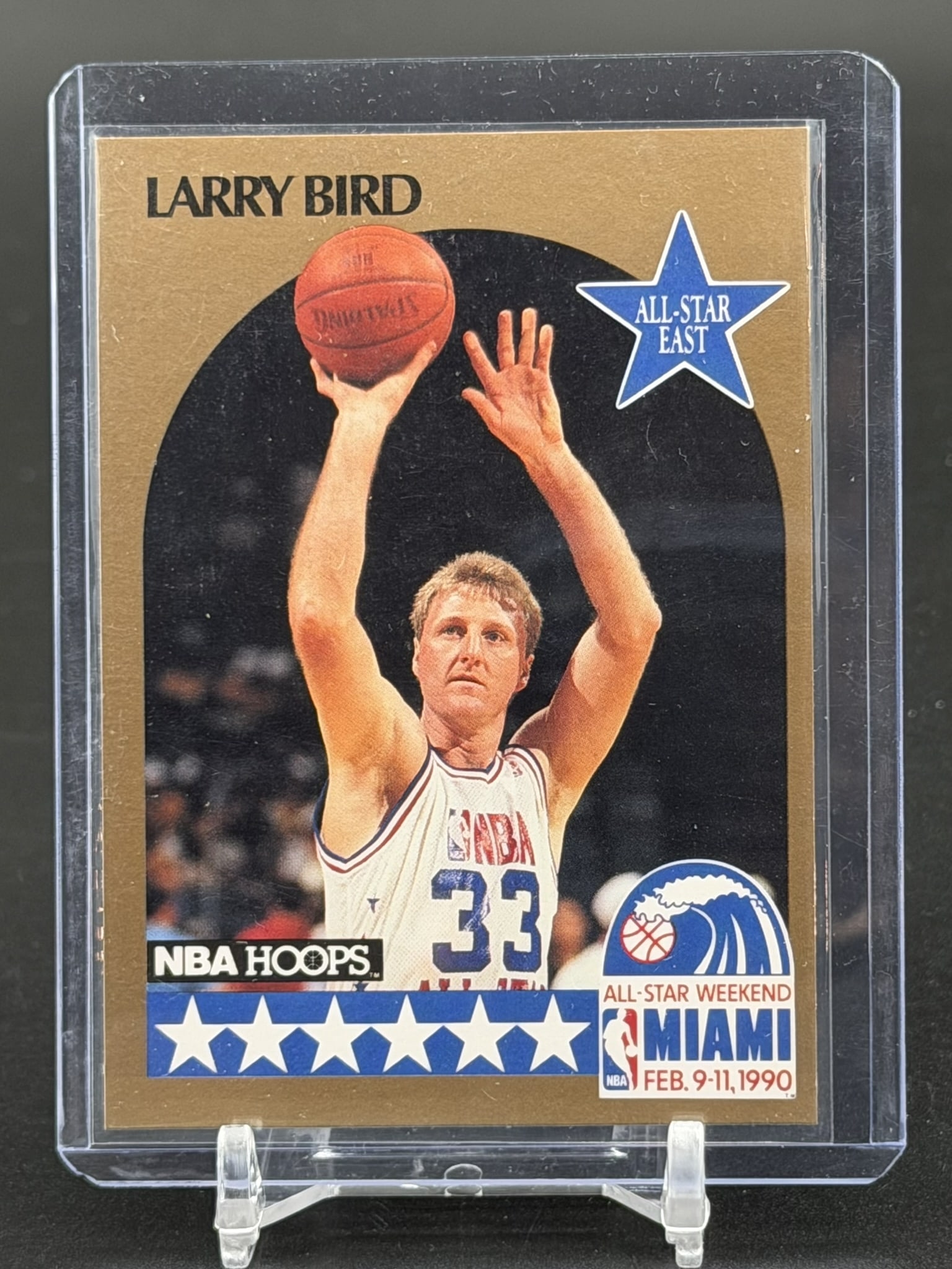 1990-91 NBA Hoops Larry Bird All-Star East Card #2 Boston Celtics Vintage Basketball Legend: Vintage 1990-91 NBA Hoops Larry Bird All-Star East card #2 featuring the Boston Celtics Hall of Famer. The front of this card showcases an action photograph of Bird shooting a basketball in his All-St