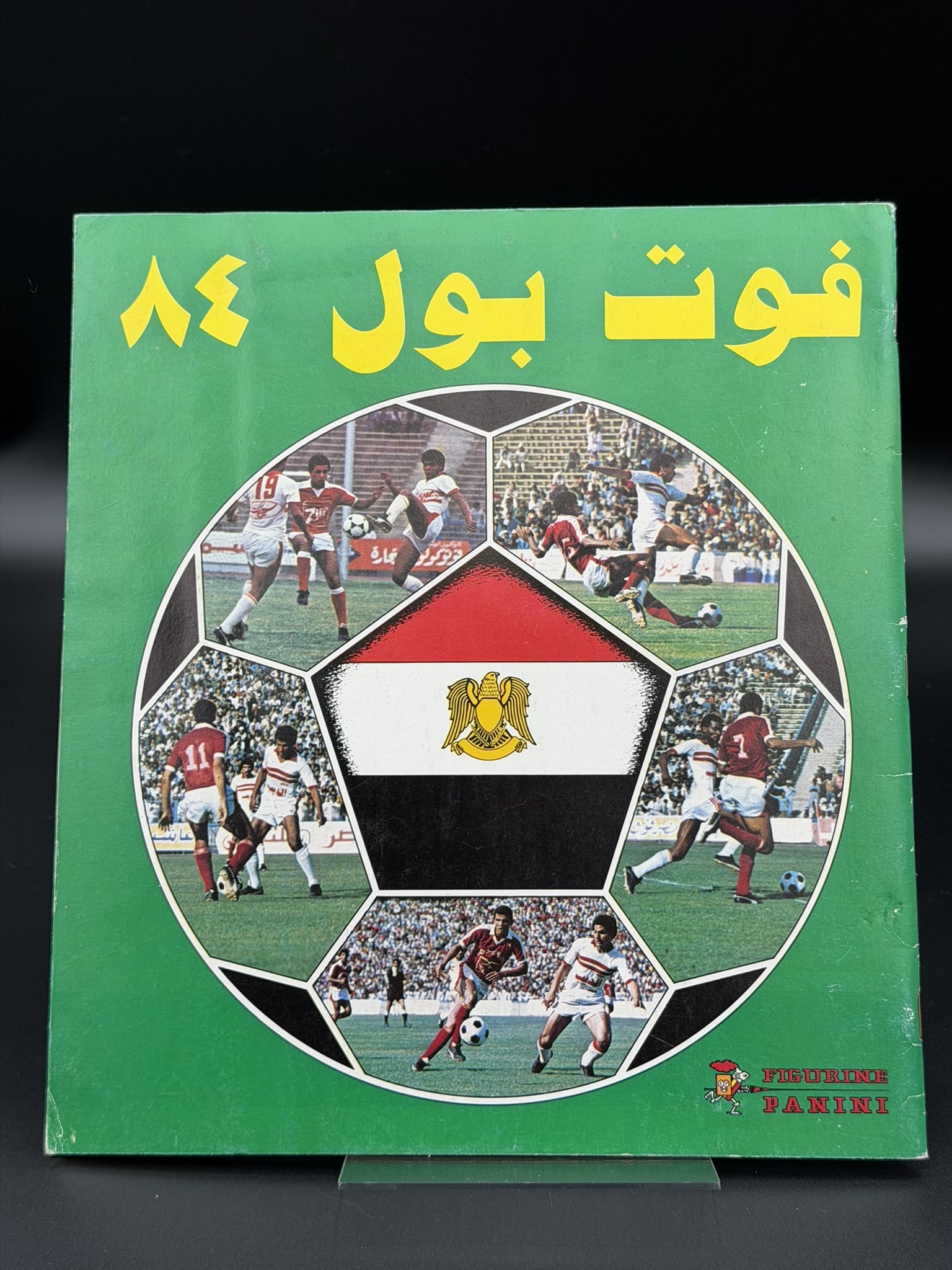 1984 Panini Foot Ball 84 Egyptian League Soccer Sticker Album Empty Original Arabic: Original Panini Foot Ball 84 sticker album produced for the Egyptian football league. Printed entirely in Arabic, this vintage collectible features club pages with designated spaces for player sticker