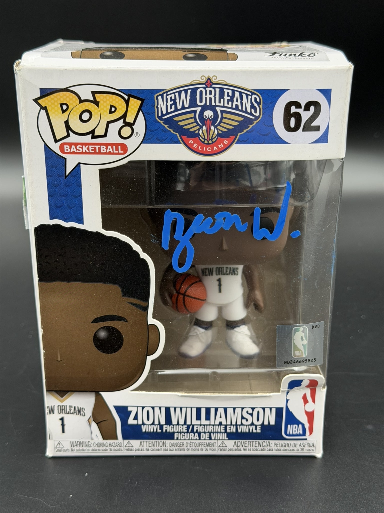 Zion Williamson Signed Funko Pop! NBA Basketball #62 ACE COA NIB: Funko Pop! NBA Basketball #62 Zion Williamson figure personally signed by Zion Williamson in blue marker across the display window. The collectible features Zion Williamson in New Orleans Pelicans uni