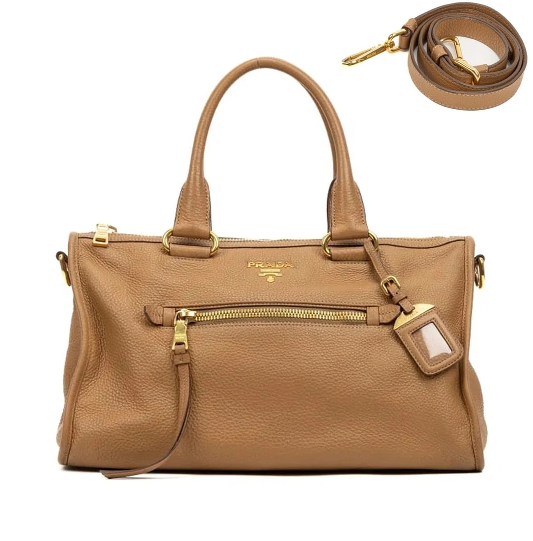 MSRP $3,295 PRADA Vitello Phenix Tan Two-Way Tote w/ Strap & COA: Prada Vitello Phenix Two Way Tote Shoulder Bag Tan Leather Gold Hardware w/ Strap & Luggage Tag / ID Holder & Dust Bag & Certificate of Authenticity (COA) Elegant and versatile Prada Two W