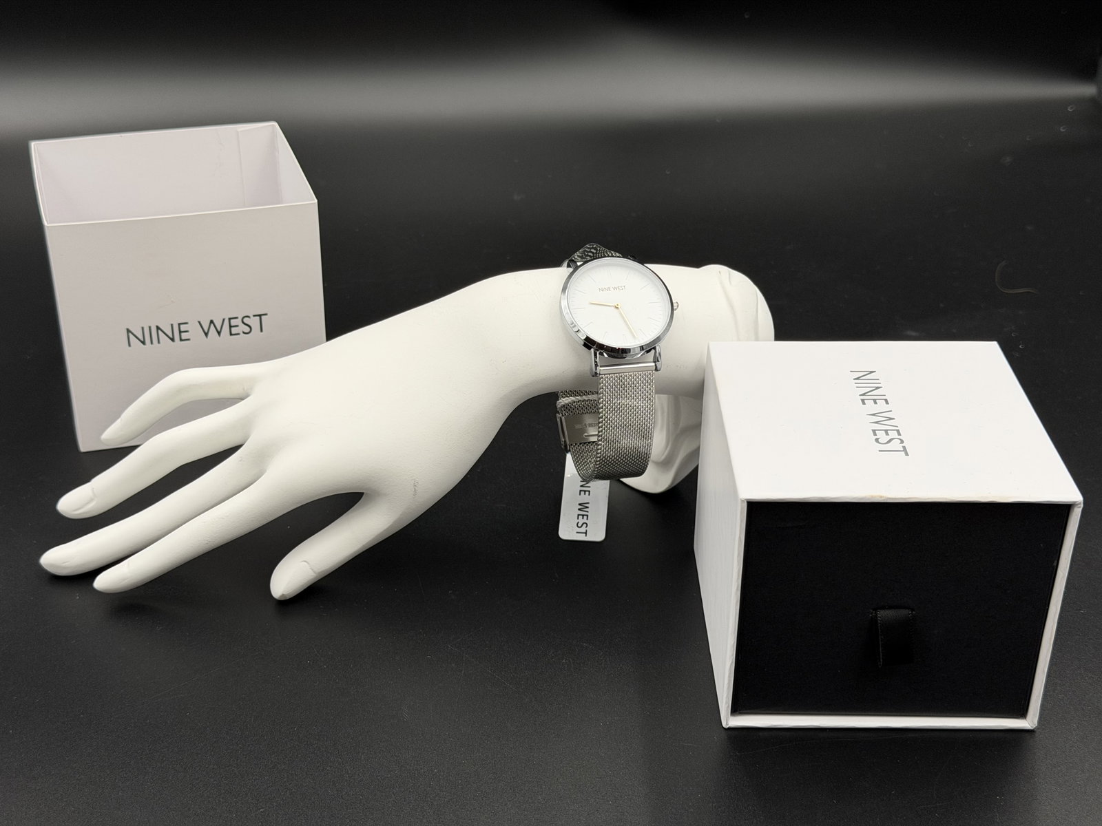 MSRP $49 NINE WEST Liana Women’s Quartz Watch White Dial Silver Mesh Bracelet NIB: Nine West "Liana" wristwatch featuring a polished silver-tone case and coordinating silver-tone mesh bracelet paired with a clean white dial. The minimalist design is accented with slim stick hour mar