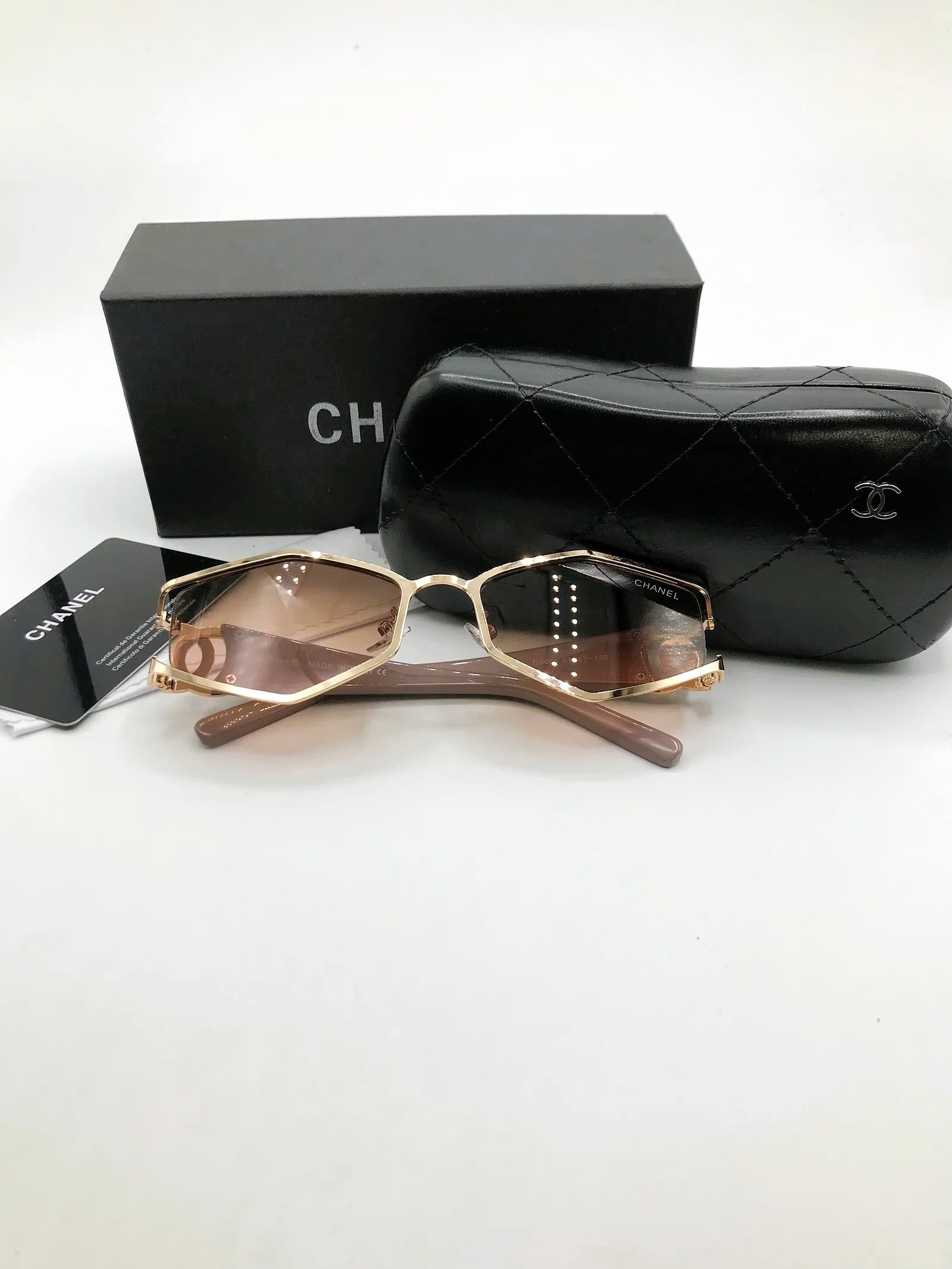 MSRP $1,495 Chanel Gold Geometric Sunglasses w/ Quilted Case & Presentation Box (Unauthenticated: PLEASE READ: This item has not been authenticated by Atomic Pear. Please ask absolutely any questions or request additional photographs before you bid. Thank you! Love, Atomic Pear Geometric sunglasse