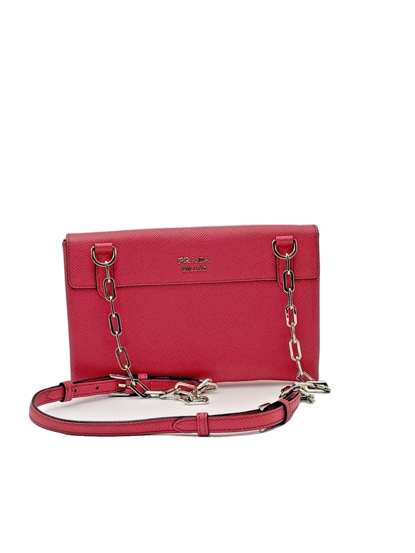 MSRP $3,495 PRADA Saffiano Chain Flap Pink Crossbody Bag COA: Prada Saffiano Cuir Pattina Chain Flap Leather Crossbody Bag in Raspberry Pink w/ Adjustable Strap & Dust Bag & Certificate of Authenticity (COA) Elevate your everyday style with this chic Pra