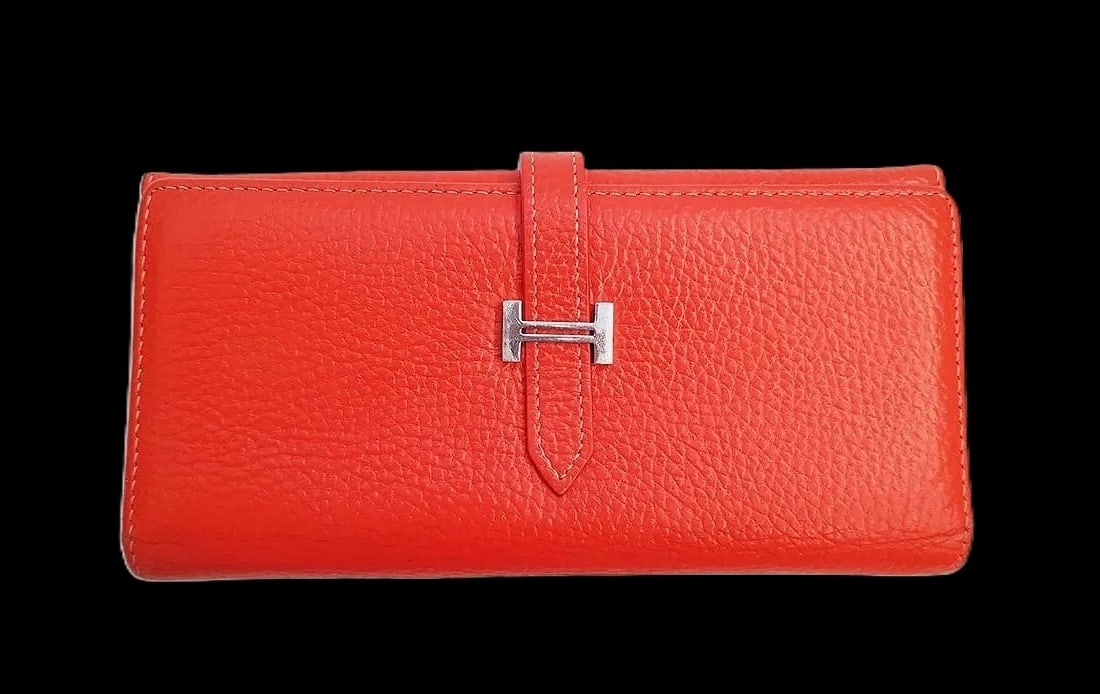 MSRP $5,500 HERMÈS Bearn Long Wallet Orange Swift Leather w/ Palladium Hardware (Una: PLEASE READ: This item has not been authenticated by Atomic Pear. Please ask absolutely any questions or request additional photographs before you bid. Thank you! Love, Atomic Pear Pre-loved HERMÈS B