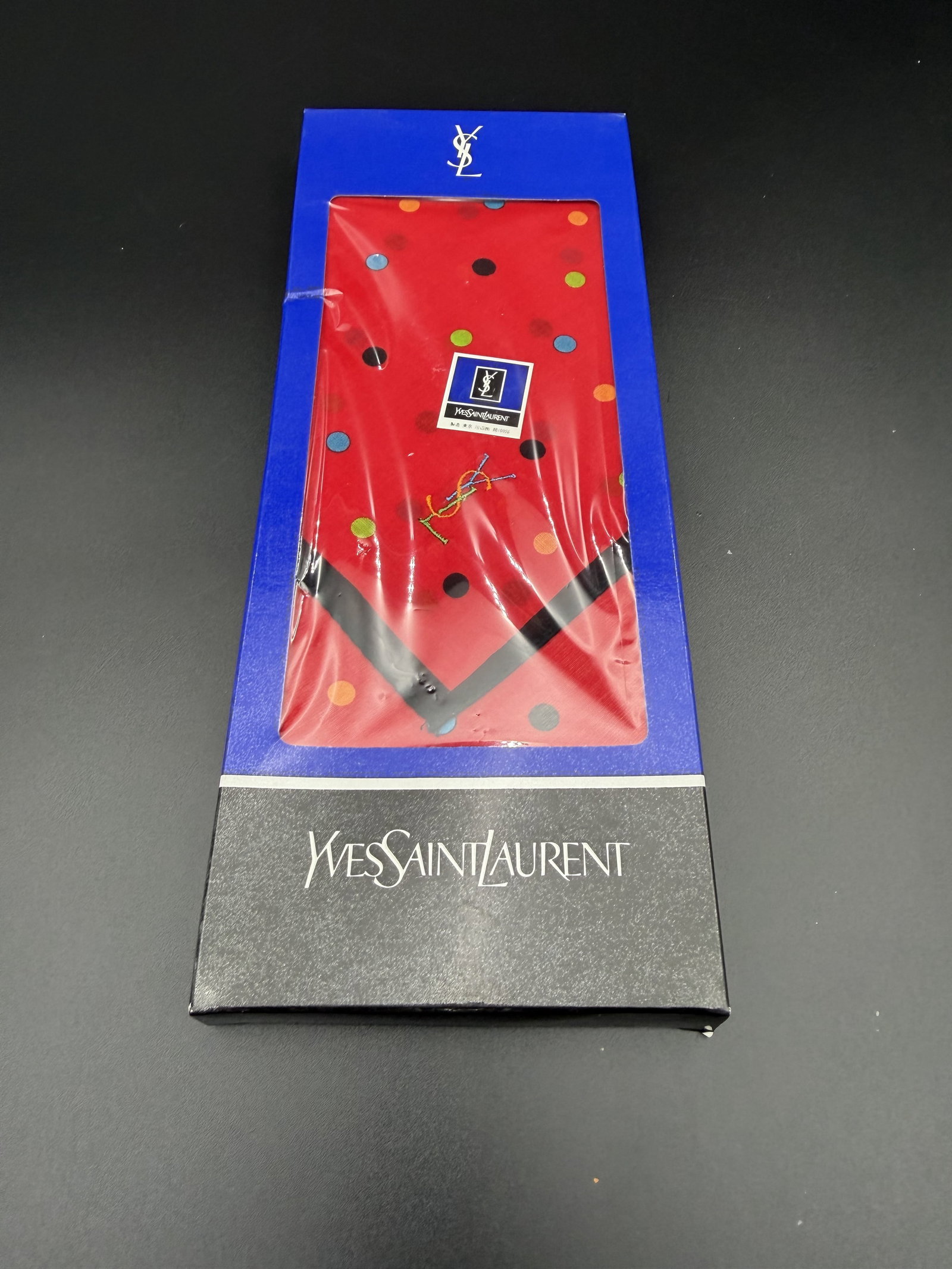 MSRP $495 YVES SAINT LAURENT Multicolor Polka Dot Scarf NWT Boxed: Yves Saint Laurent scarf presented in original branded box and retaining original tags. Features a vibrant red ground accented by multicolor polka dots and finished with contrasting dark borders and e