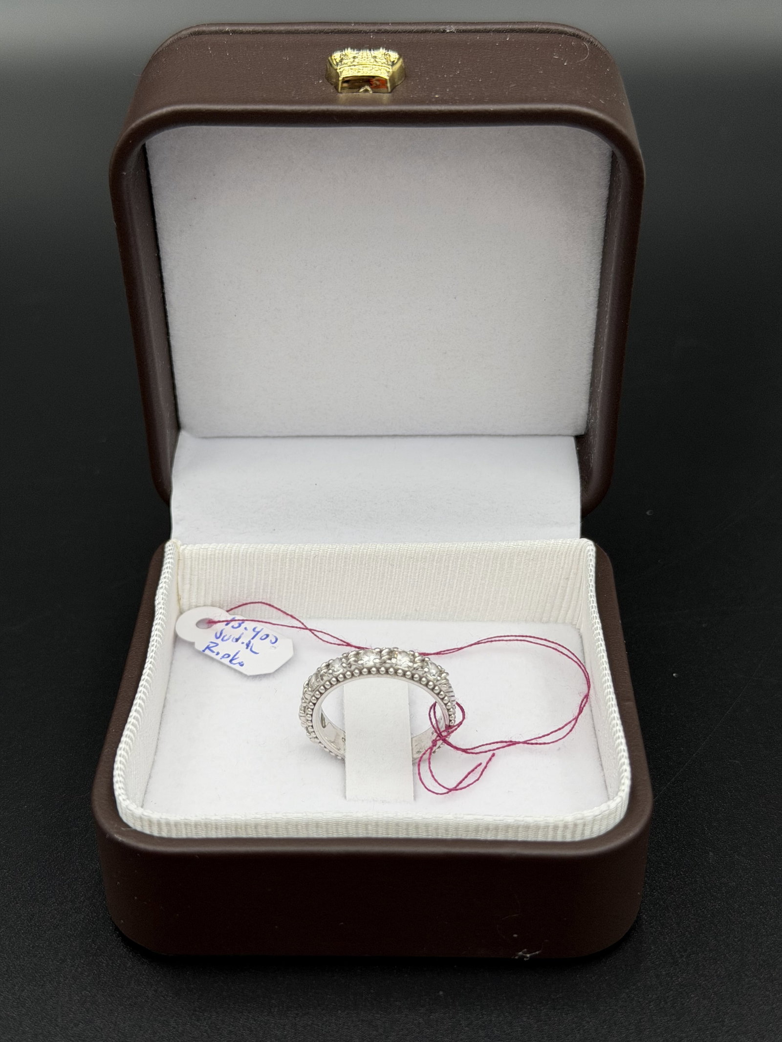 MSRP $795 JUDITH RIPKA Diamonique Eternity Band Ring Sterling Silver Size 8 4.16 g w/ Box: Judith Ripka eternity-style band ring crafted in sterling silver and set with a continuous row of round brilliant Diamonique stones. The design features Ripka’s signature beaded detailing and te
