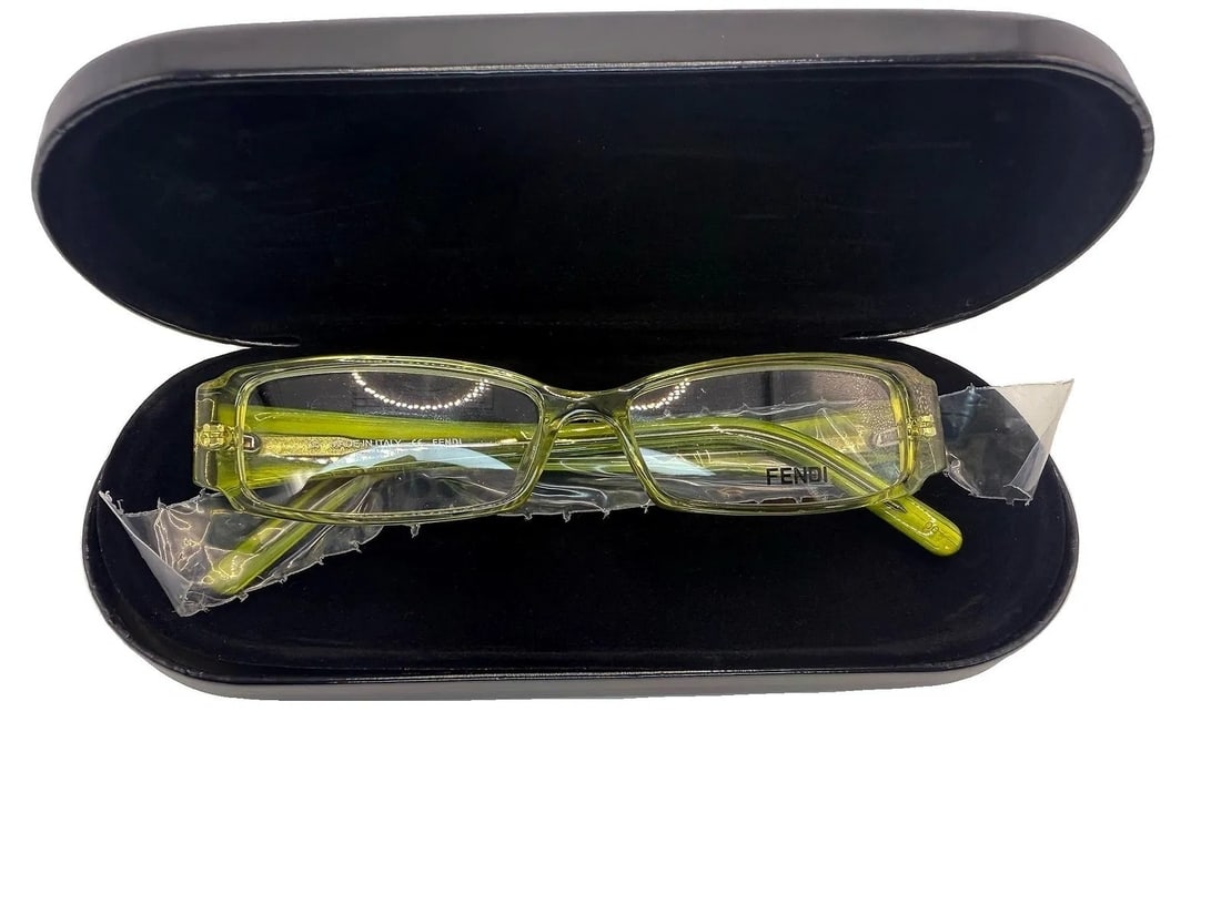 MSRP $795 FENDI Clear Green Eyeglasses w/ Tortoise Temples Made in Italy NWOT: Fendi rectangular eyeglasses featuring a clear green frame paired with tortoise-pattern temples, crafted in Italy and marked Fendi / Made in Italy. Comes with a sleek black case for storage/protection