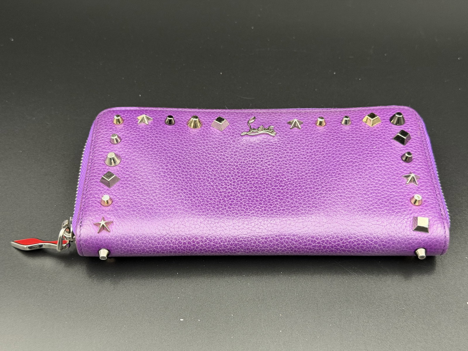 MSRP $1,050 CHRISTIAN LOUBOUTIN Panettone Zip-Around Wallet in Calf Empire Leather with Trashmix (Un: PLEASE READ: This item has not been authenticated by Atomic Pear. Please ask absolutely any questions or request additional photographs before you bid. Thank you! Love, Atomic Pear Christian Louboutin