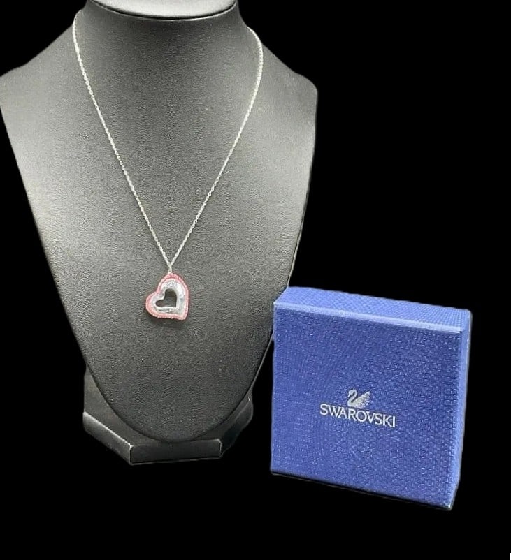 MSRP $195 Swarovski Heart Necklace Vintage 17": Swarovski Heart Necklace Vintage 17" Offered is a vintage Swarovski heart necklace featuring Swarovski’s signature crystal sparkle in a romantic heart motif. This is a versatile piece that can b