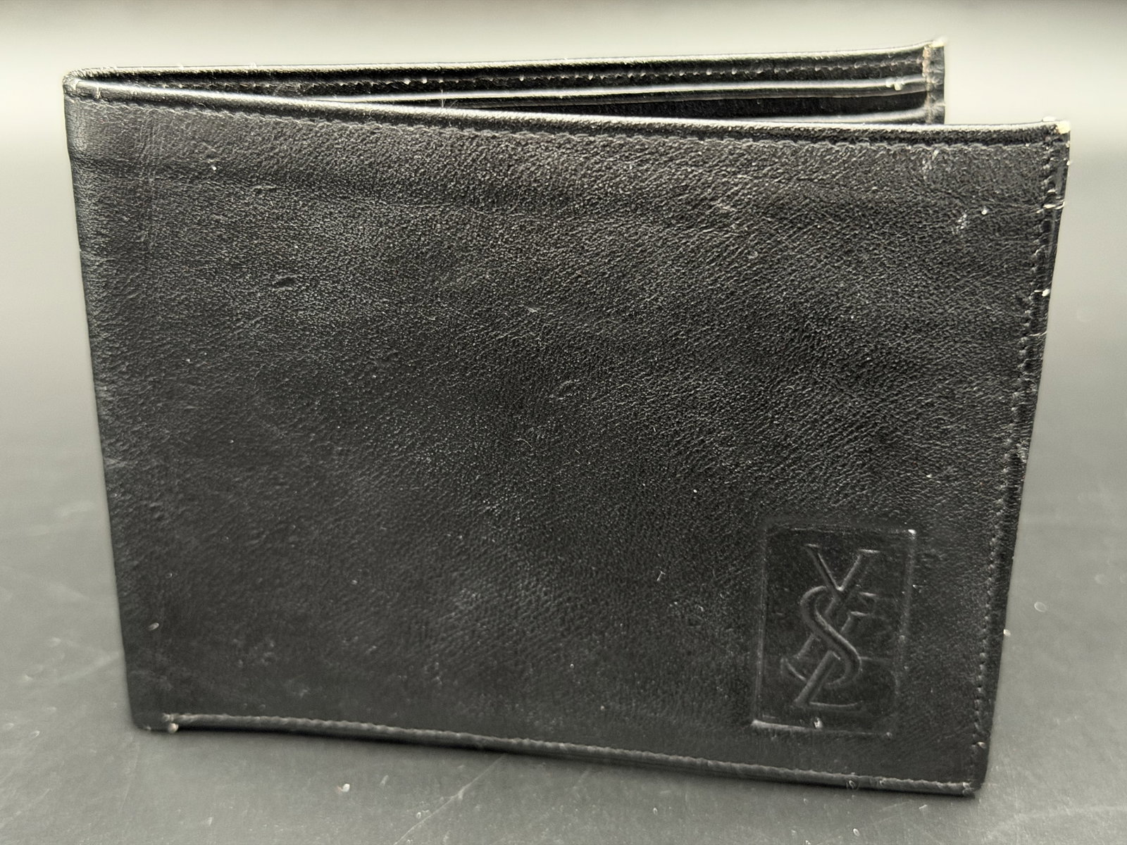 MSRP $695 Vintage Yves Saint Laurent Black Textured Leather Men's Bifold Wallet (Unauthenticated) (1 of 13)